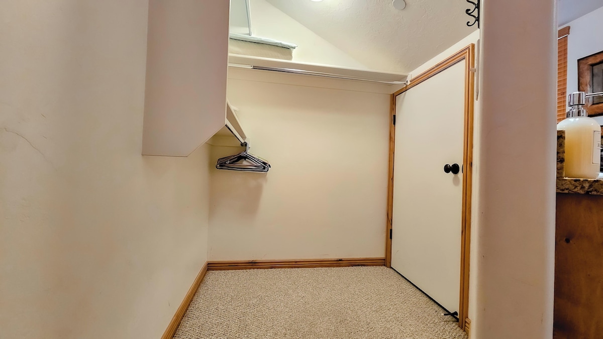 There is plenty of storage space available in the walk in closet.