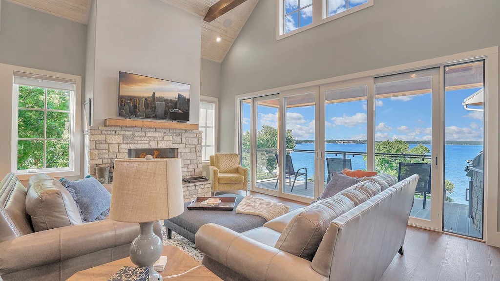 Lots of room for family to gather around fireplace and large flat screen TV.