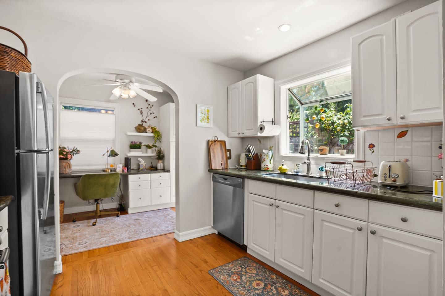 Enjoy a fully equipped kitchen with stainless steel appliances, a gas stove, microwave and dishwasher