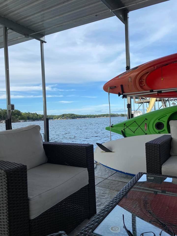 Come on down to the concrete dock and enjoy the kayaks or paddle boards, or just sit and relax and watch the boats. See views of Monkey Island and the main channel from Buck Creek Cove.