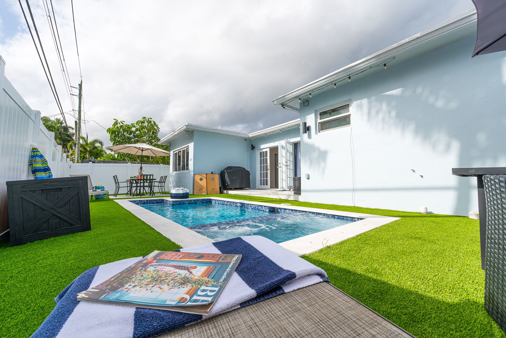 Enjoy your own private pool and hot tub, gas fire pit lounge, outdoor dining, and games—ideal for families and groups seeking a fun Florida escape.