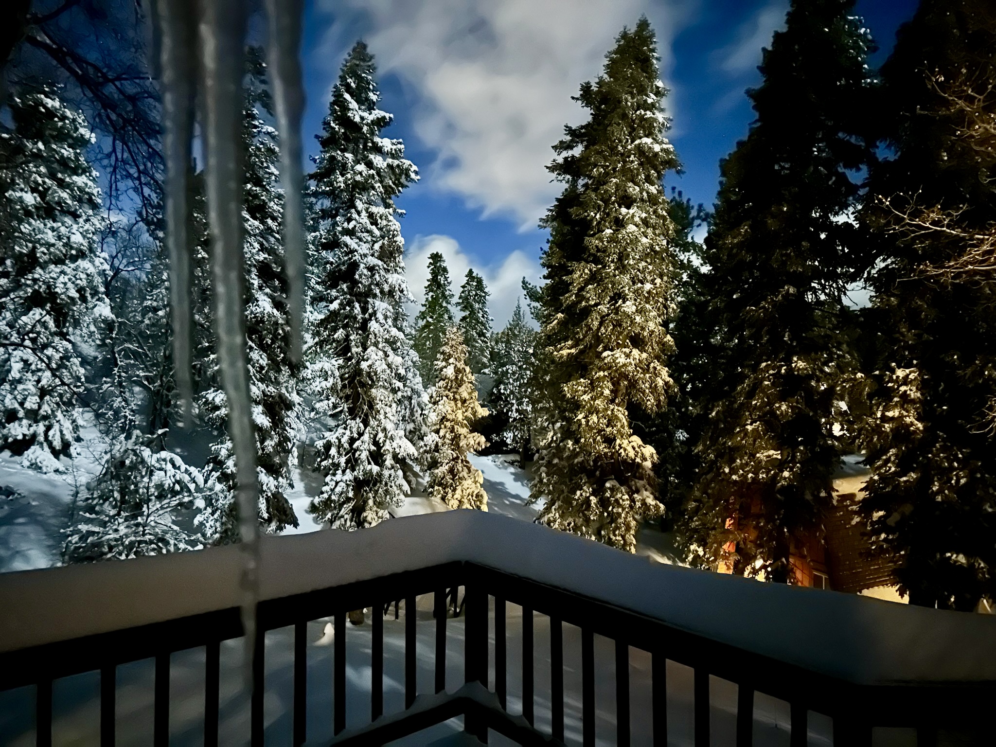 Snowy moonlit night on the back deck outside of the master bedroom.