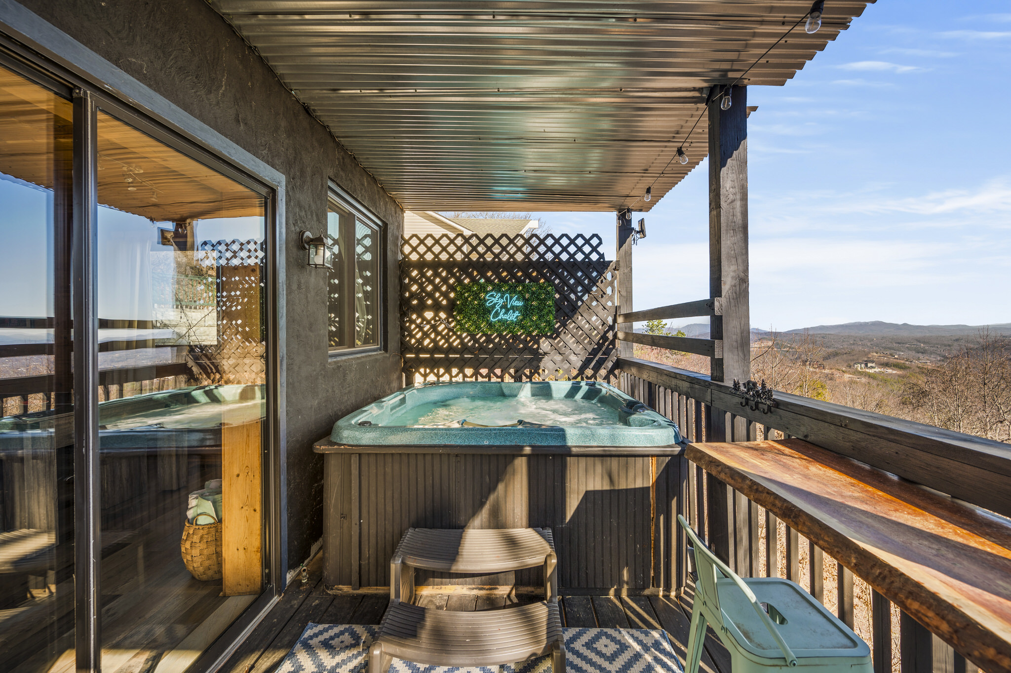 The hot tub deck is sure to be your favorite spot featuring endless views and plenty of room to relax
