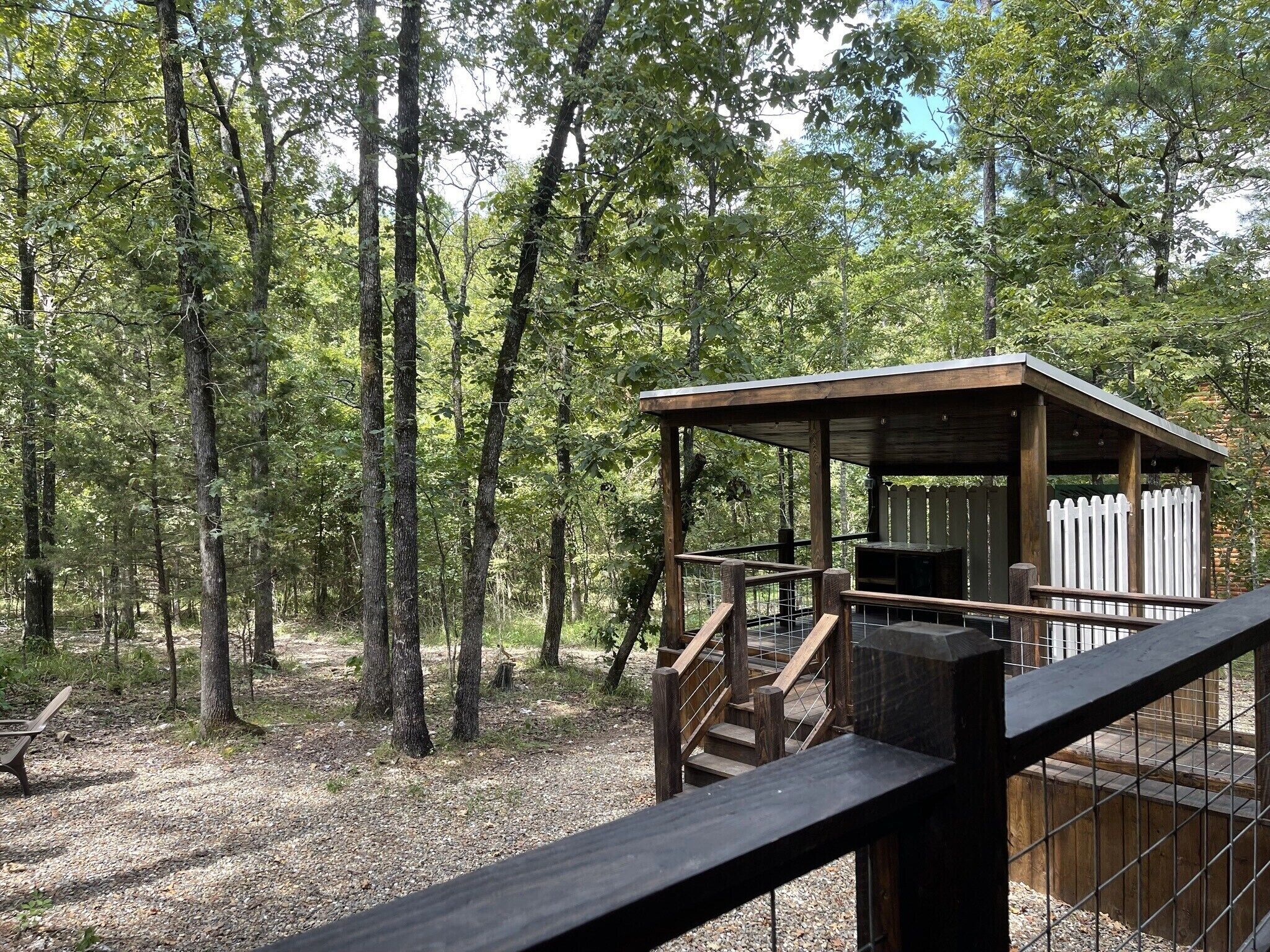 View of the hot tub area and out towards the Ouachita National Forest.