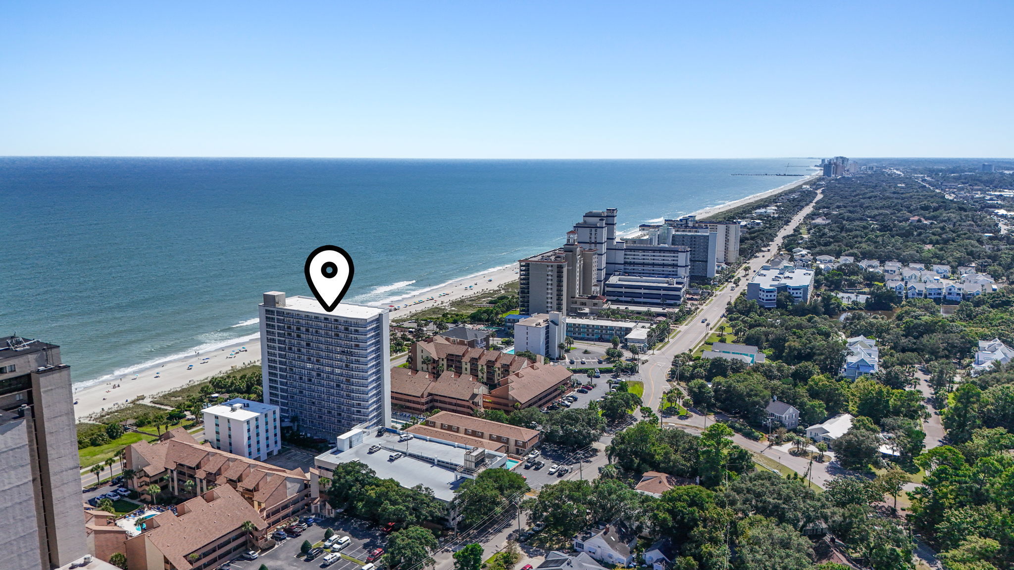 Aerial view of Forest Dunes and the beach
