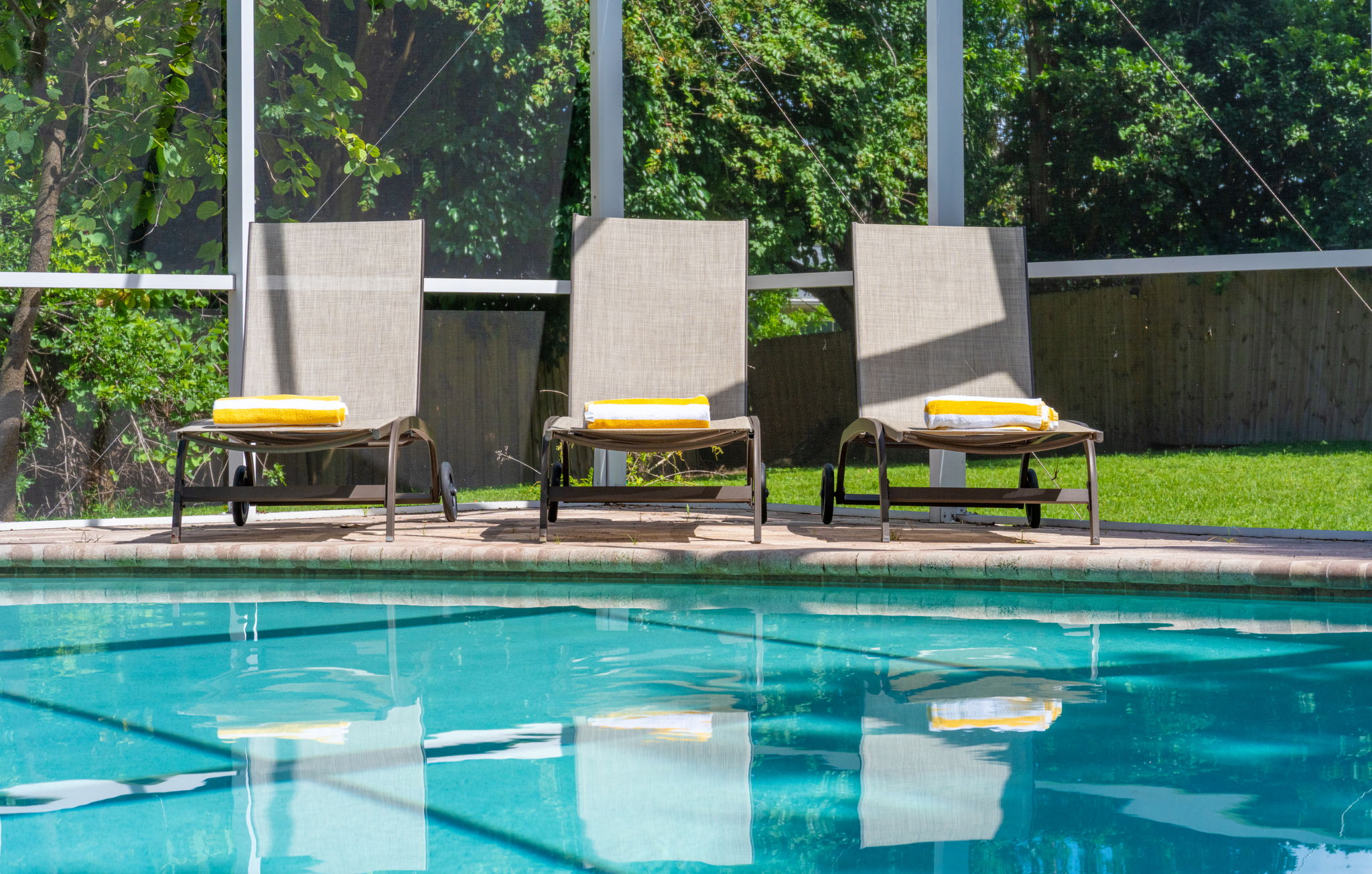 Enjoy your own private oasis with a sparkling pool and relaxing spa, perfect for sunny Florida living.