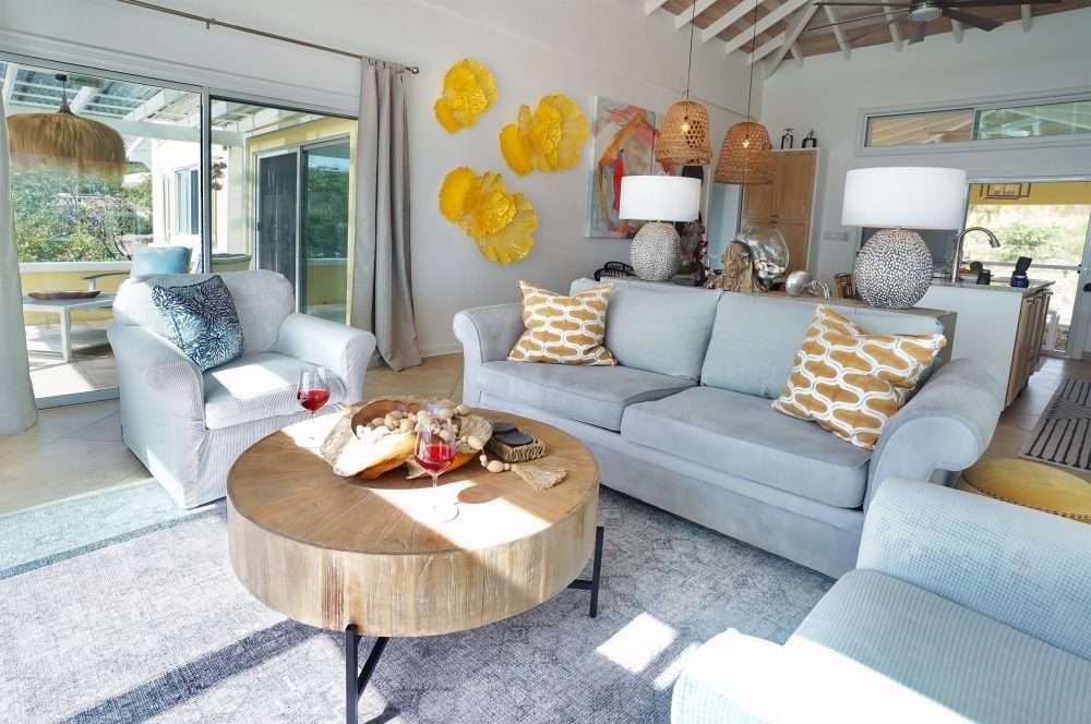 Comfortable seating in the air conditioned living room will give you great views while keeping cool