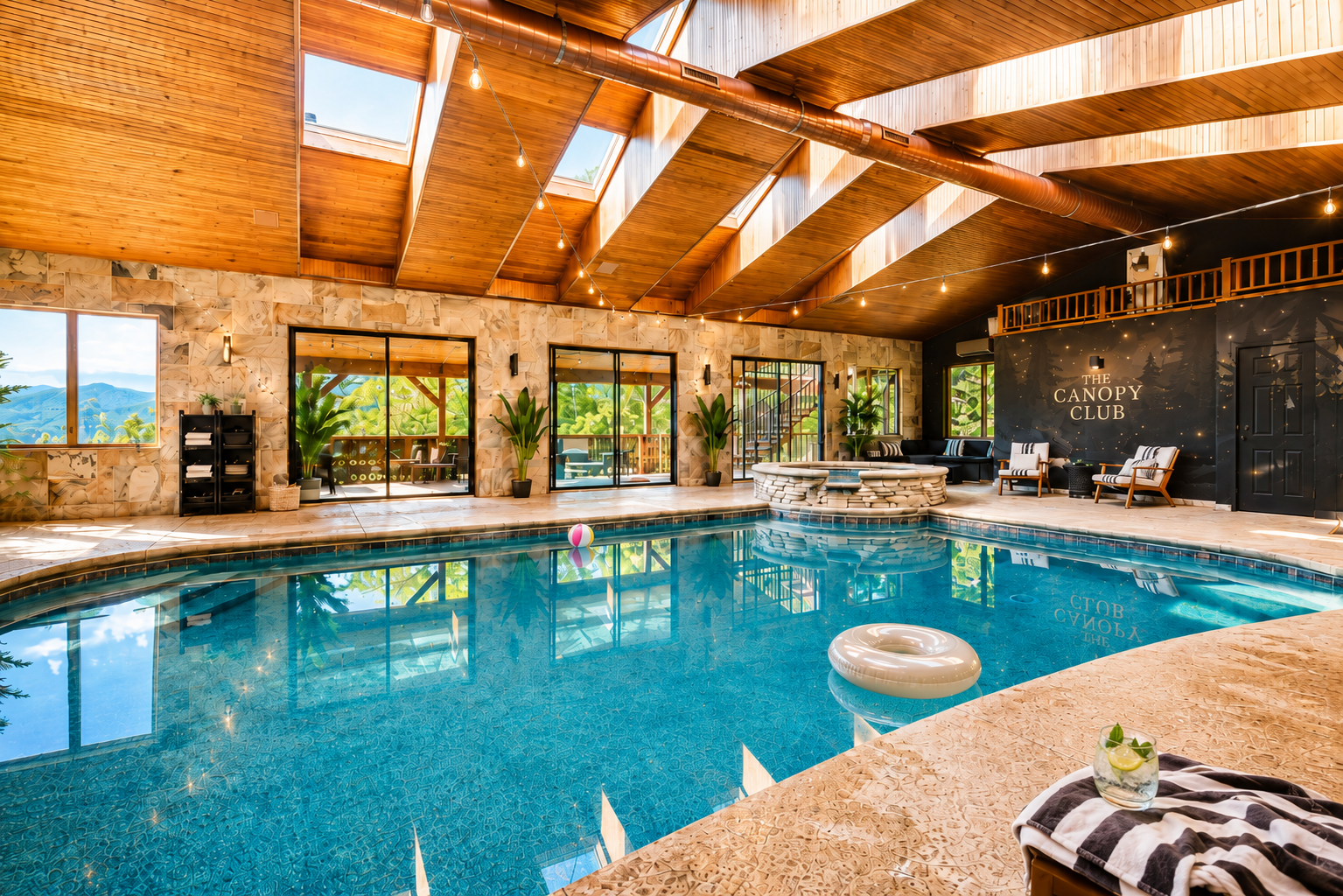 {Indoor Pool House} Your private mountain resort awaits—swim beneath soaring skylights, soak in the bubbling hot tub, and unwind surrounded by forest and Blue Ridge Mountain views at Canopy Club.

