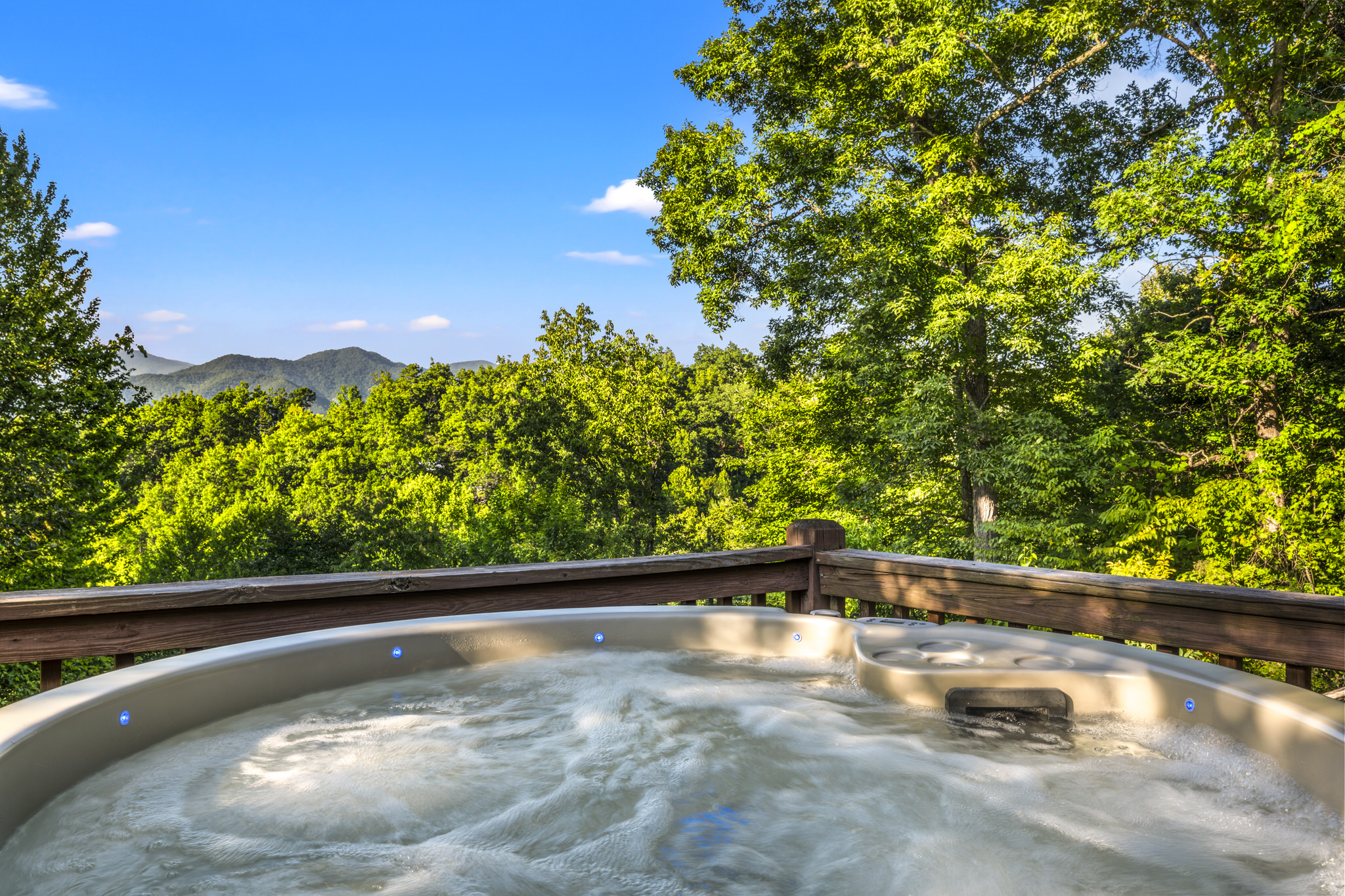 Soak, relax, and take in the View—this is what cozy mountain getaways are all about.