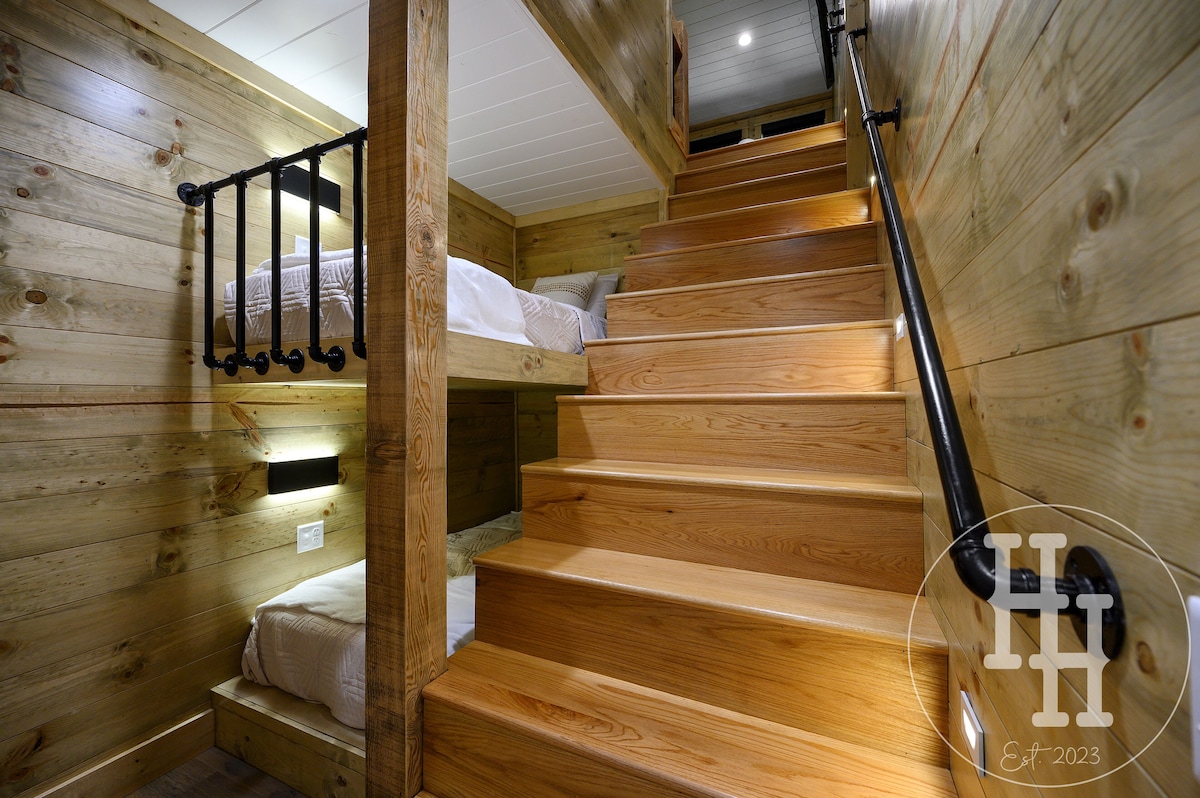 Lit stairs and handrail to loft. 2 built in bunks with personal lights, plugs