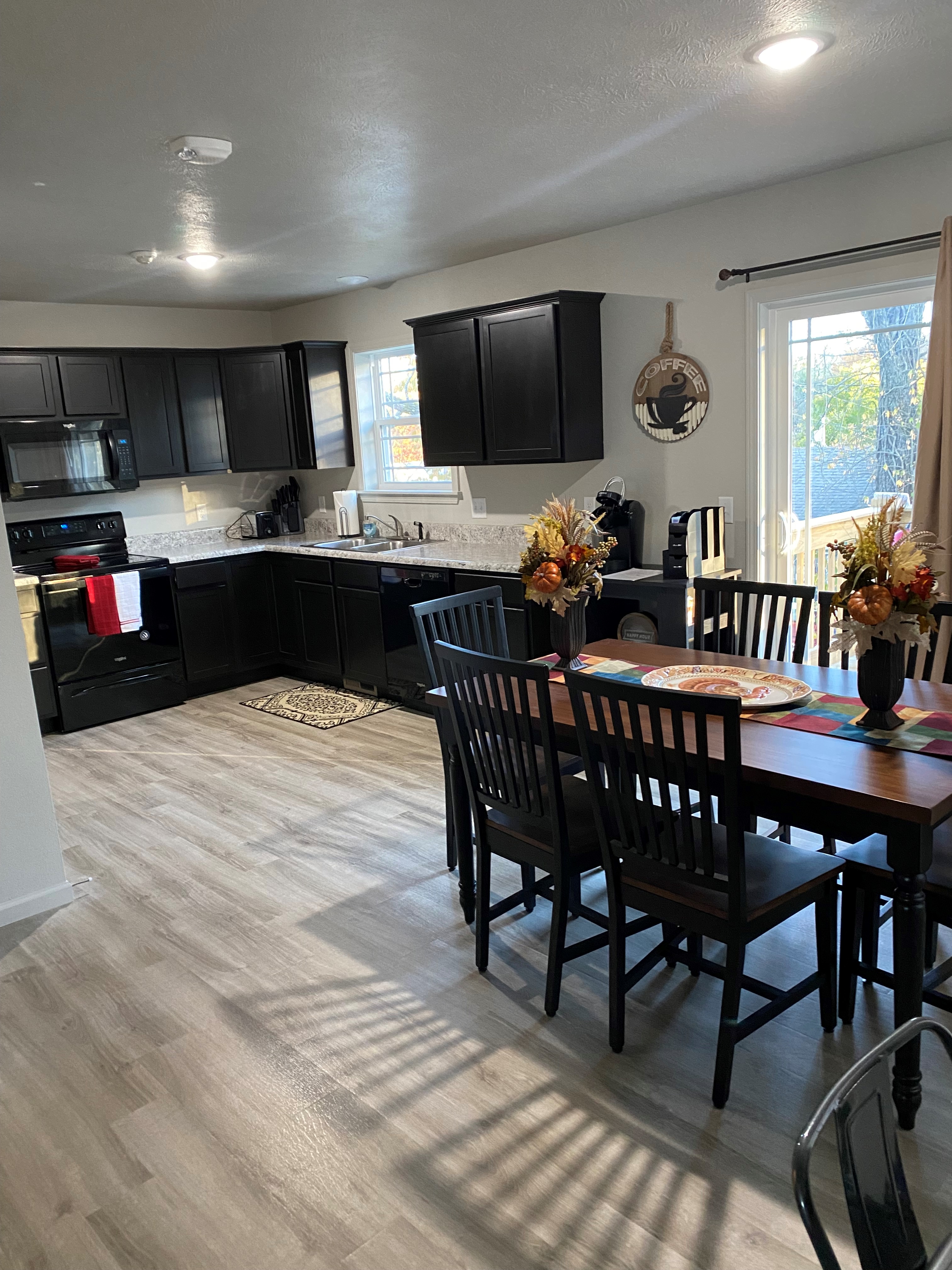 The entire family can gather at the kitchen dining area to discuss the days fun
