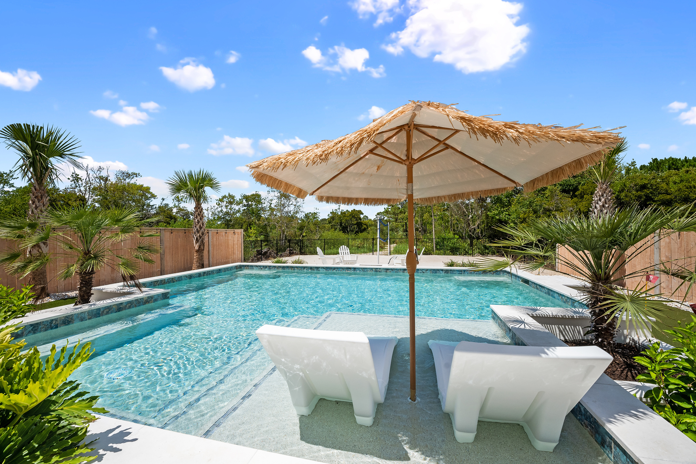 Private pool with a sun shelf, in-water loungers and plenty of room to cool off.