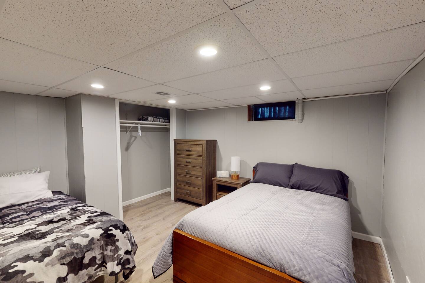 Bedroom #7 with a queen and twin bed.