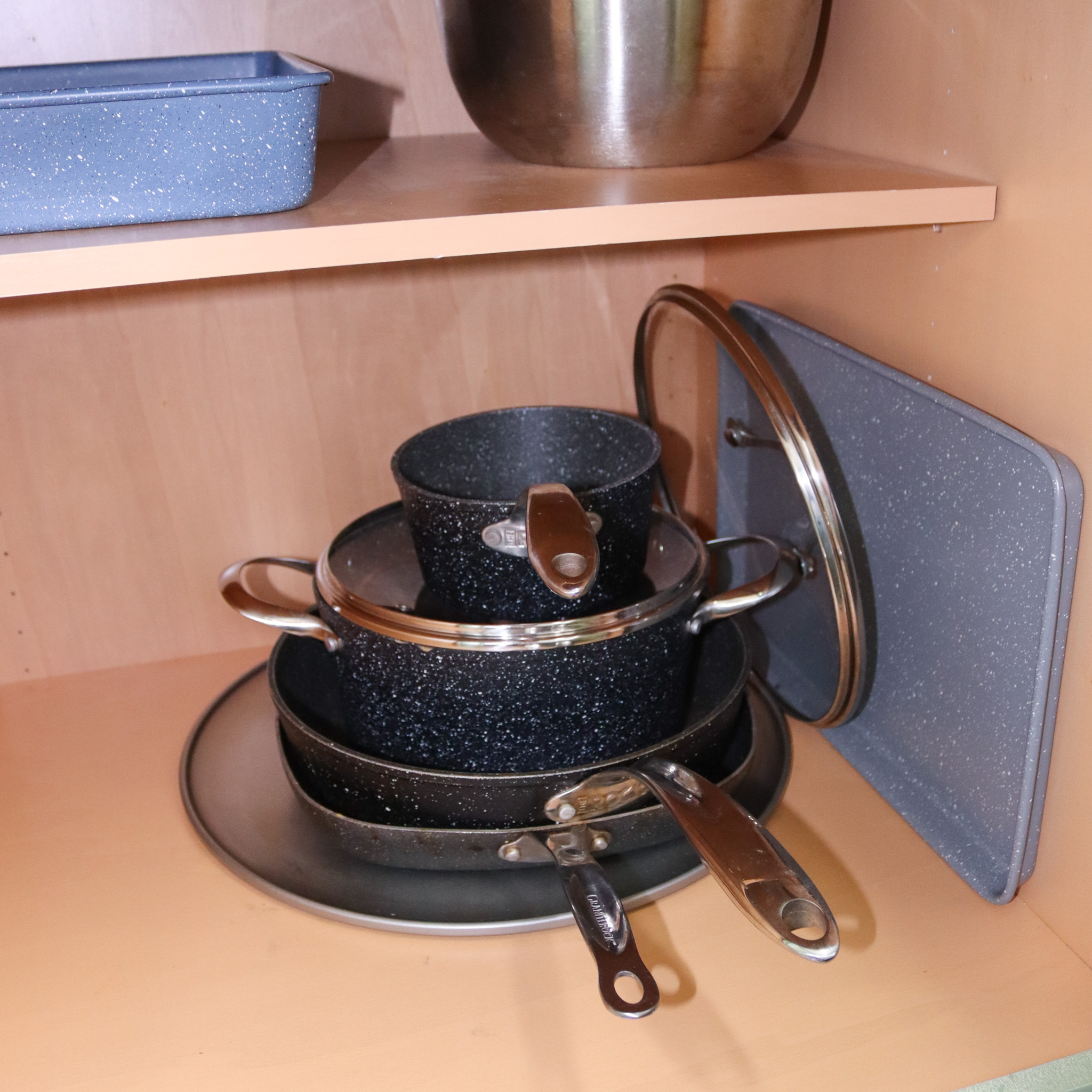 Fully stocked with cookware, dishes, and utensils