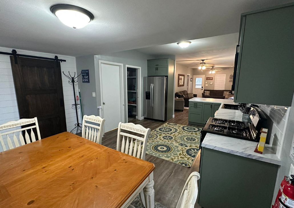 Dining that opens to the kitchen and living room.