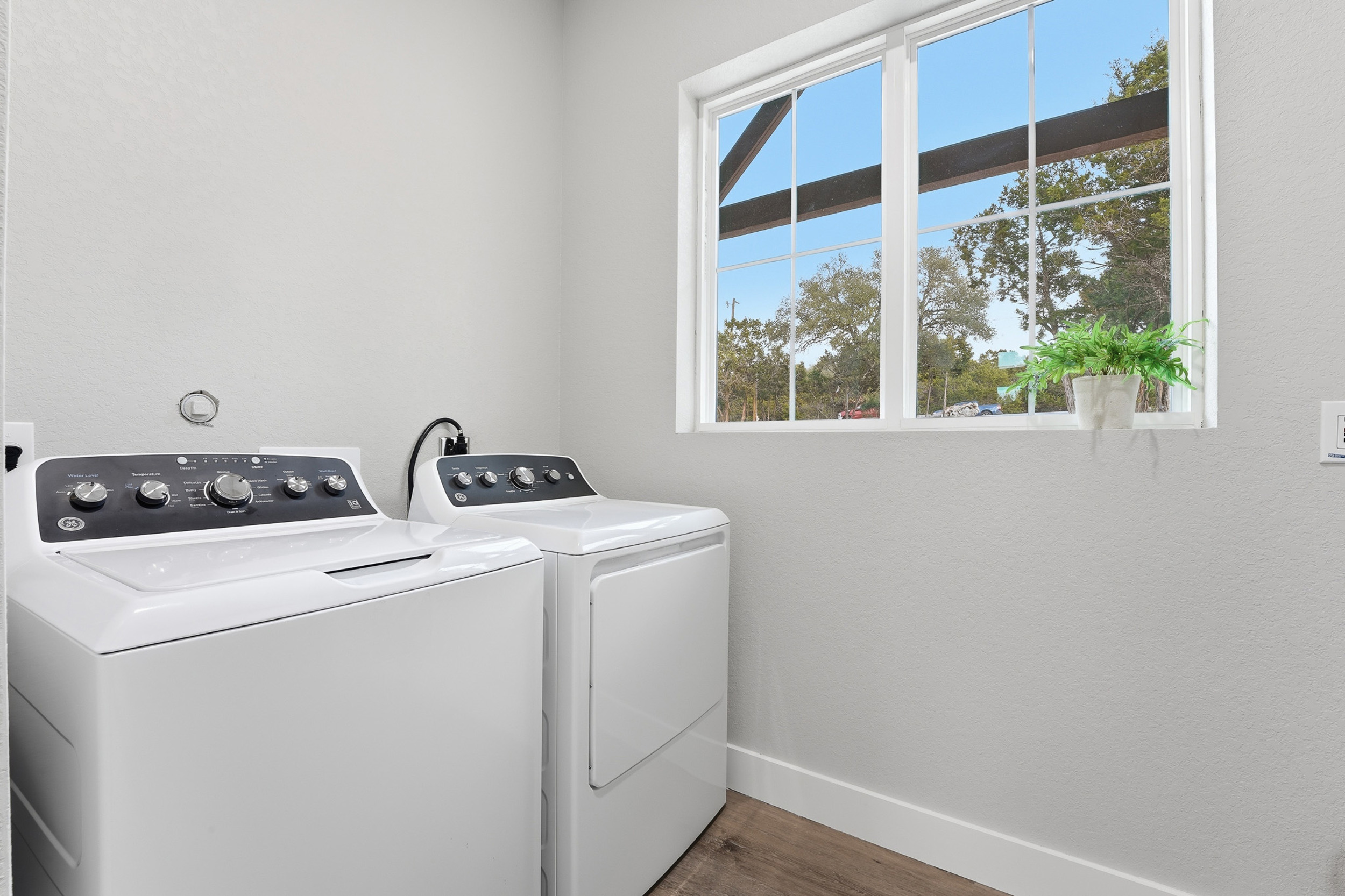Full laundry room available for guest use, ideal for longer stays.