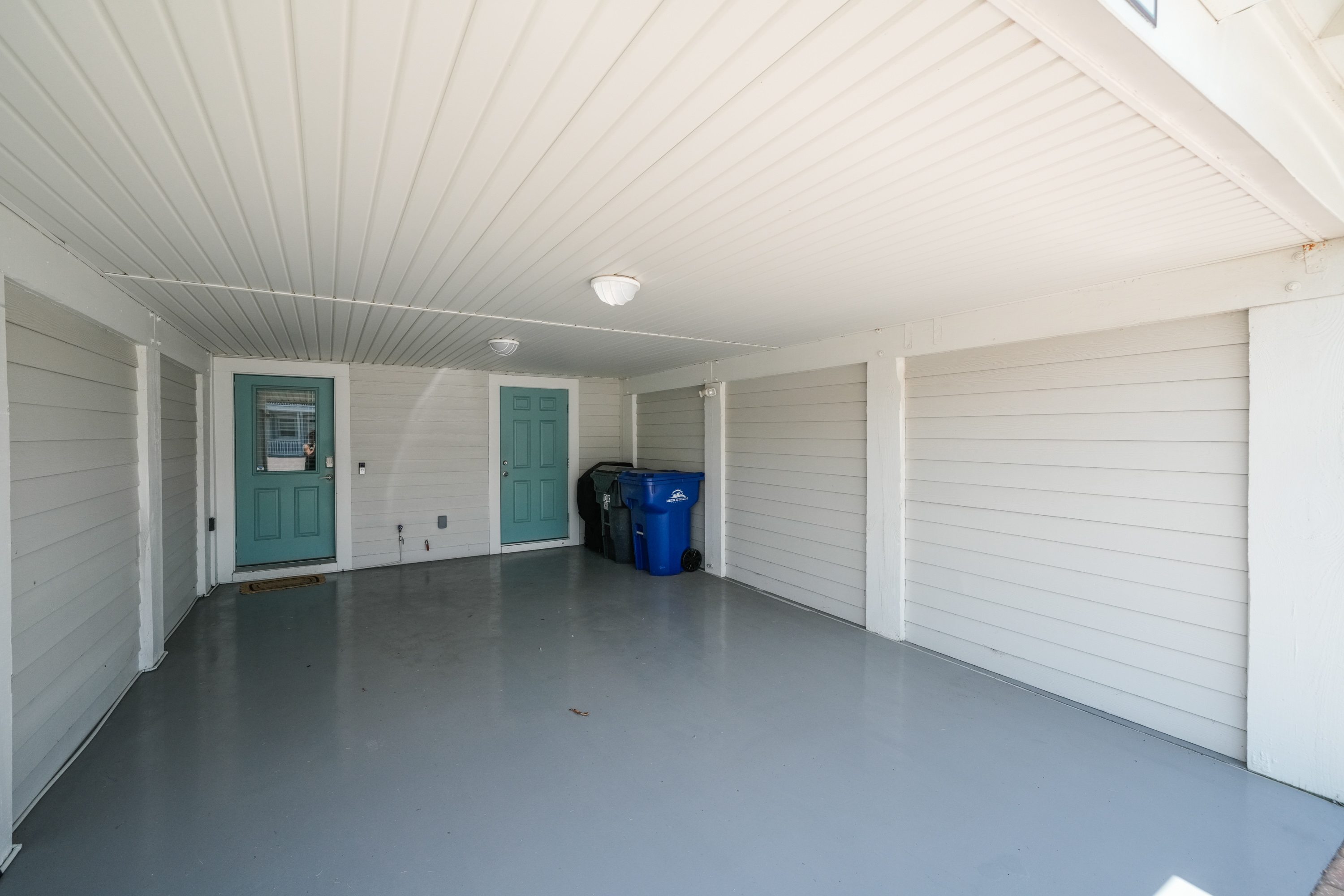 Private covered carport with protected parking and hassle-free access