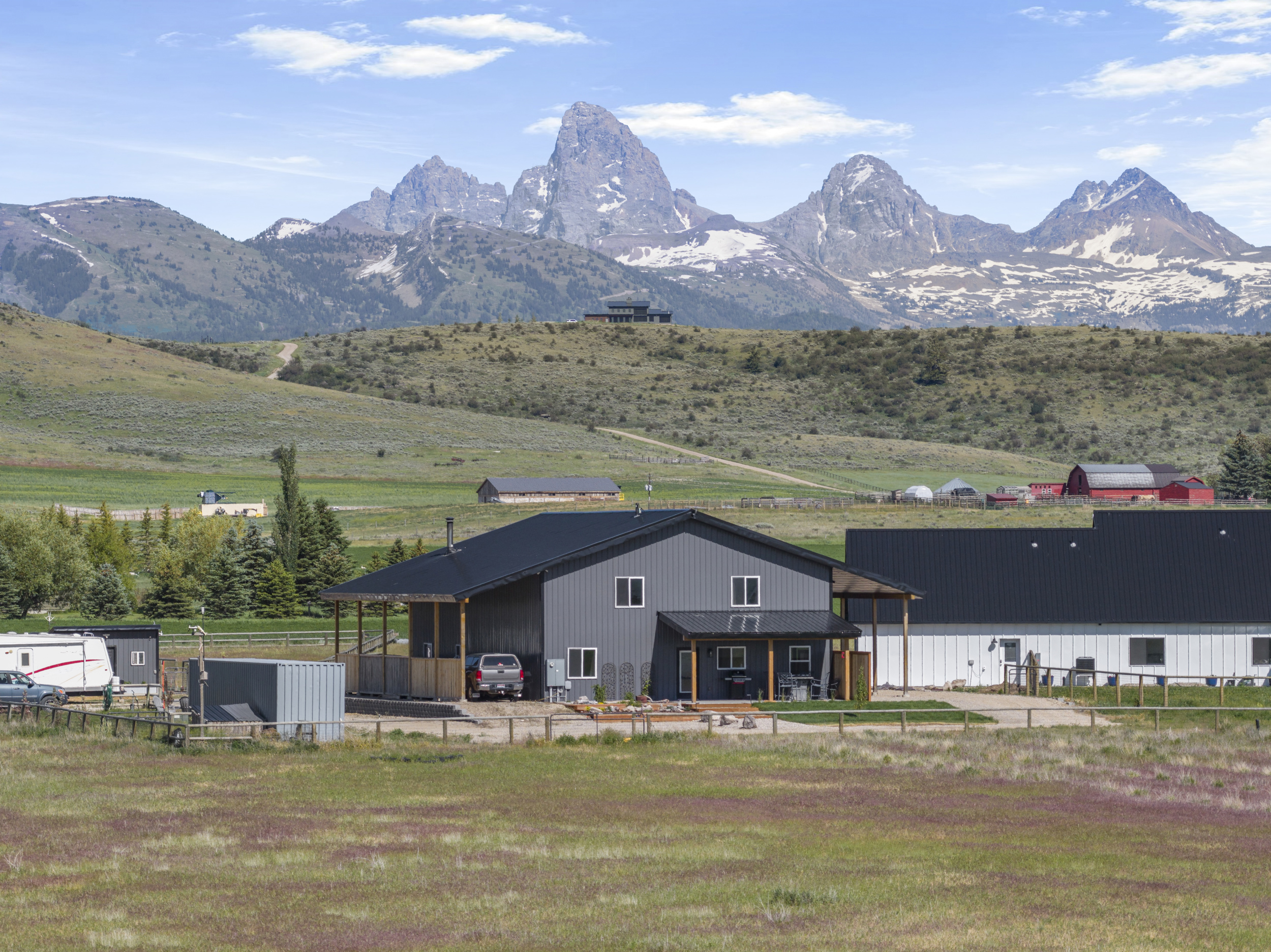 Exterior of home with breathtaking views of the Teton Mountain Range.