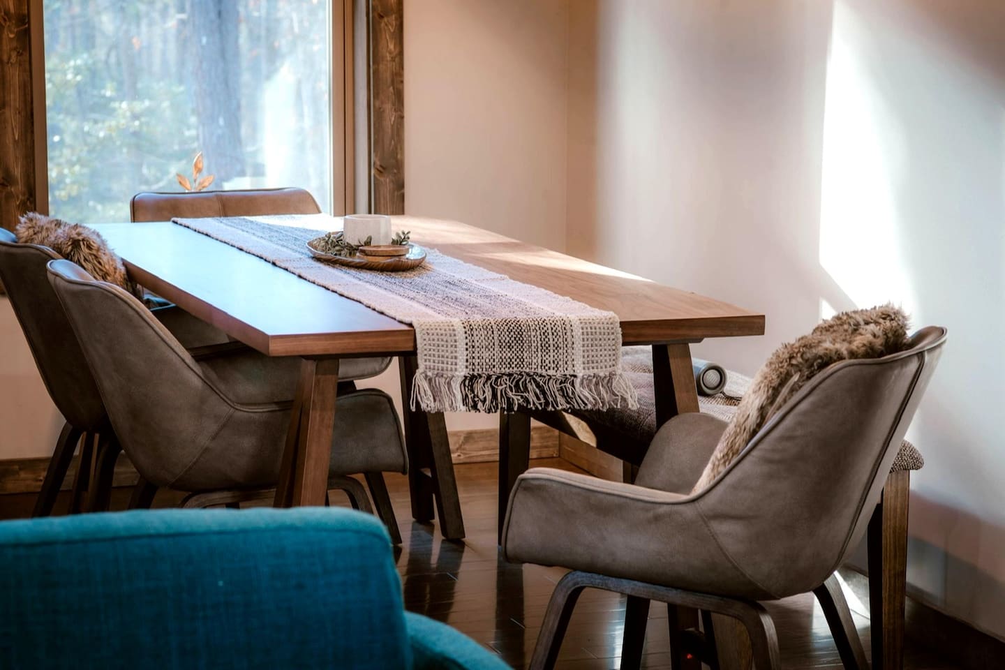 Dining table and island seating, perfect for family meals.