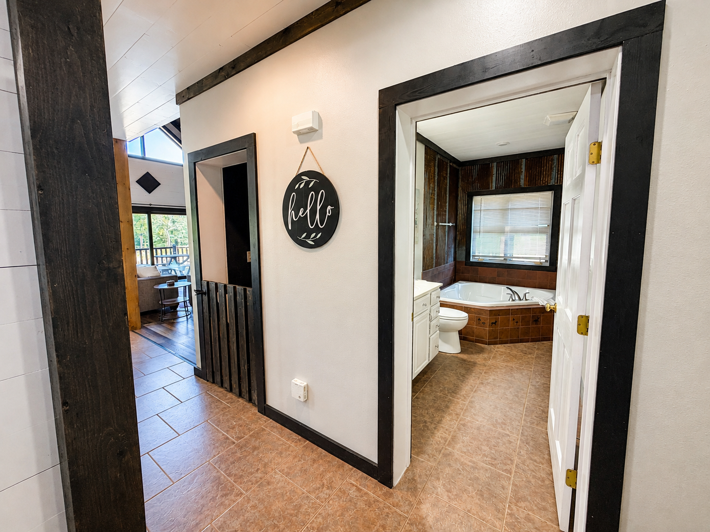 Back downstairs, the basement steps have kid safety door. It is located right off the kitchen.
