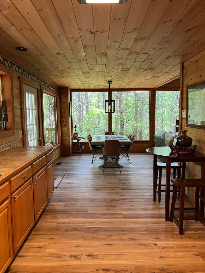 "This Open Floor Plan Connects Creates a Warm Inviting Space Perfect for Gathering"