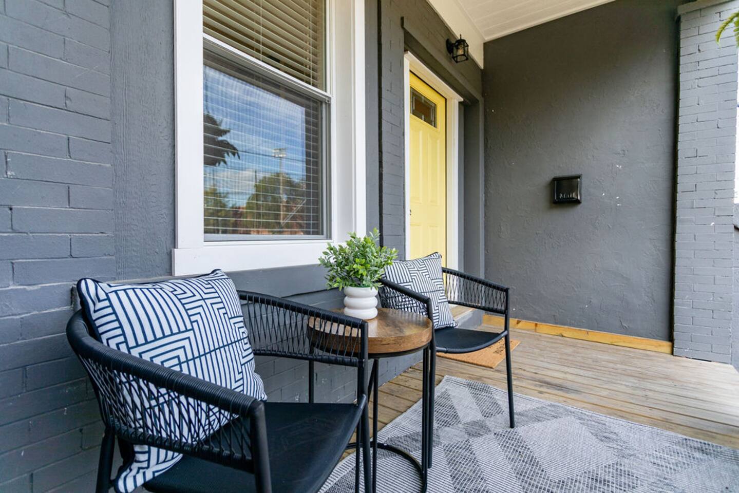 Charming front patio, perfect for relaxing and enjoying the outdoors.