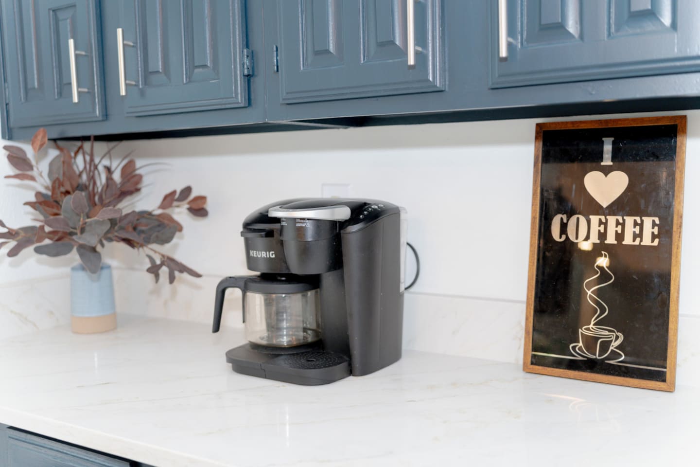 Keurig coffee maker with chic seasonal decor.