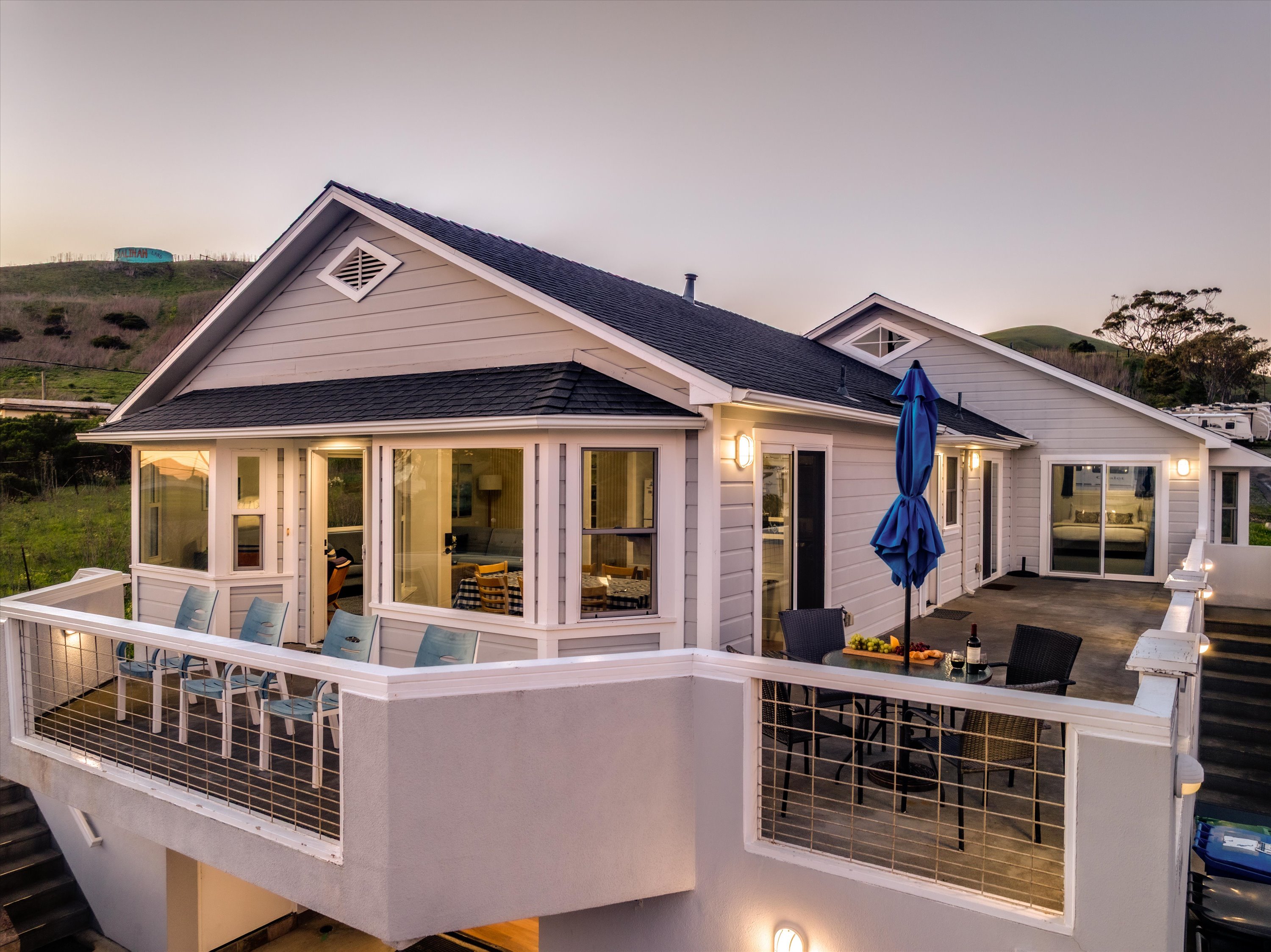 Coffee in the morning, wine at night — this is your all-day hangout spot with the best views of the ocean.