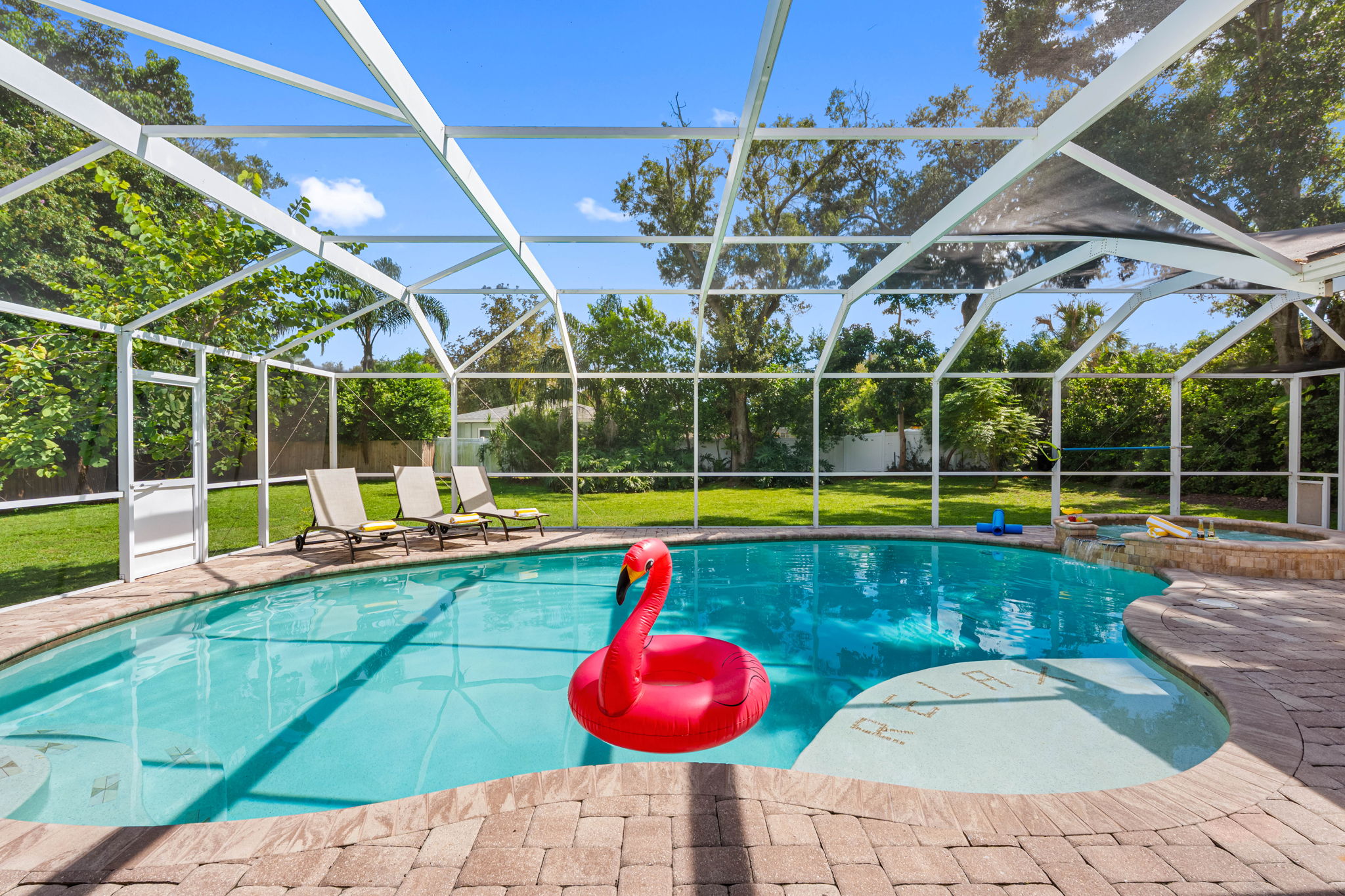Elegant pool deck design ideal for backyard entertaining.