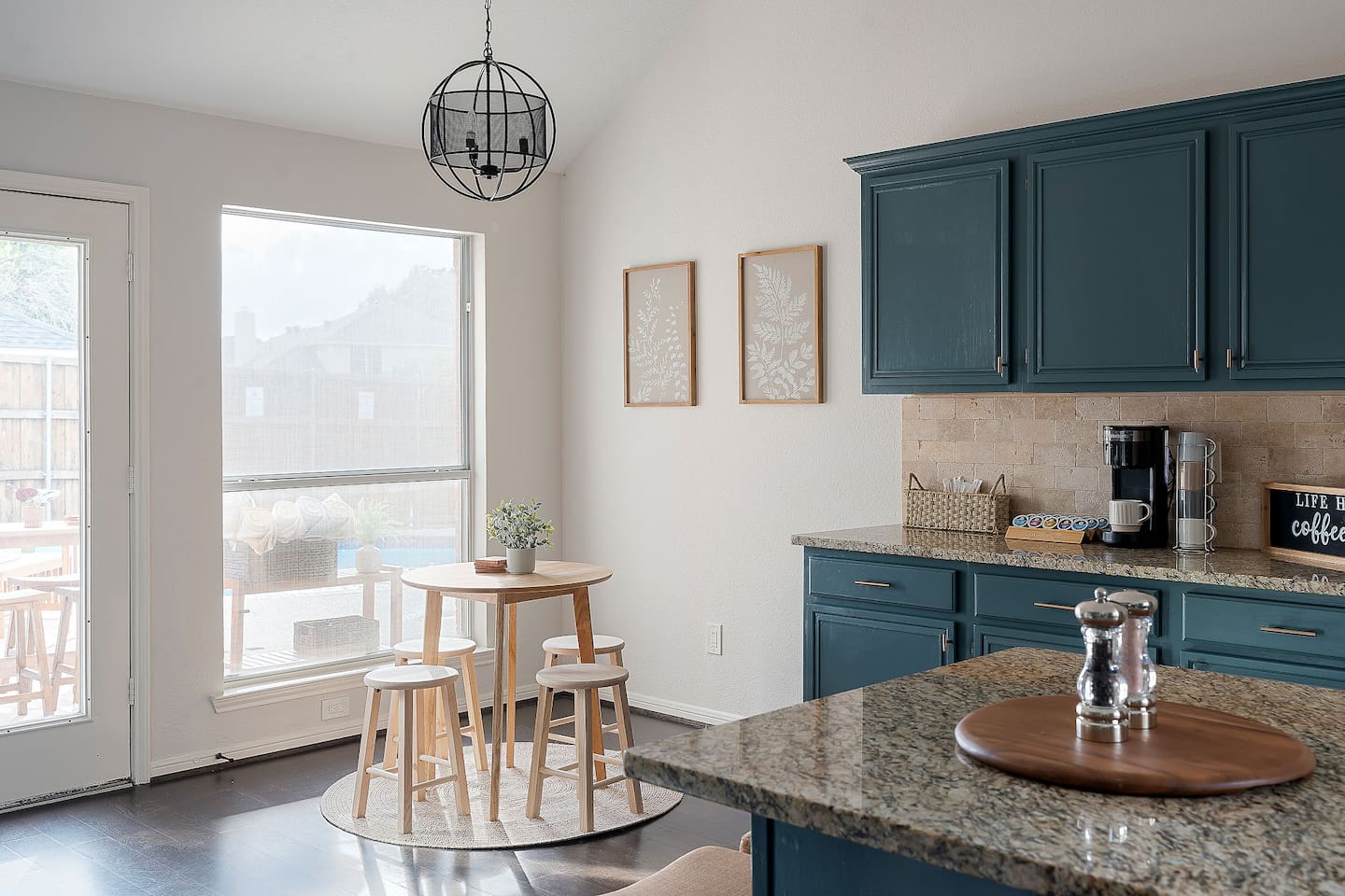 Experience culinary bliss in this fully equipped kitchen, where every tool awaits its master chef. Adjacent, a cozy kitchen seating area invites gatherings and gastronomic adventures alike.