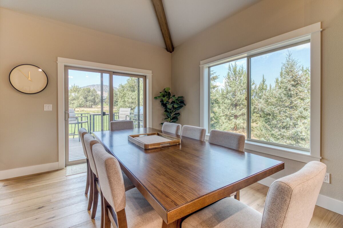 Our large dining table seats 8 with spots for 4 more at the island.