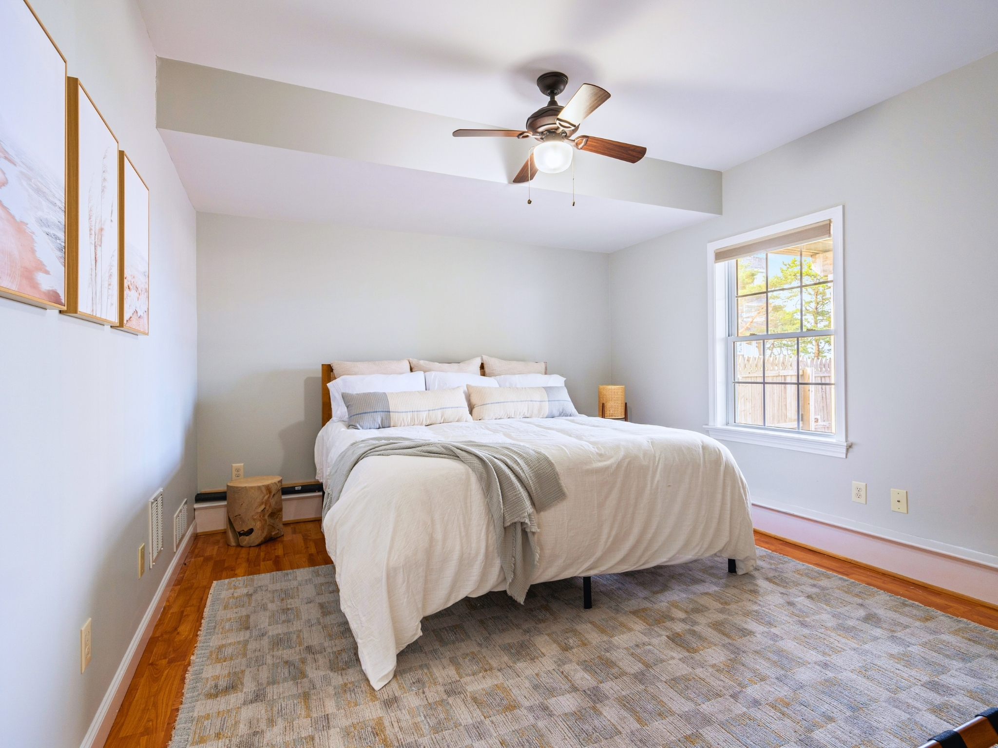 Welcome to our second basement bedroom, featuring a plush king bed—perfect for a restful night’s sleep!