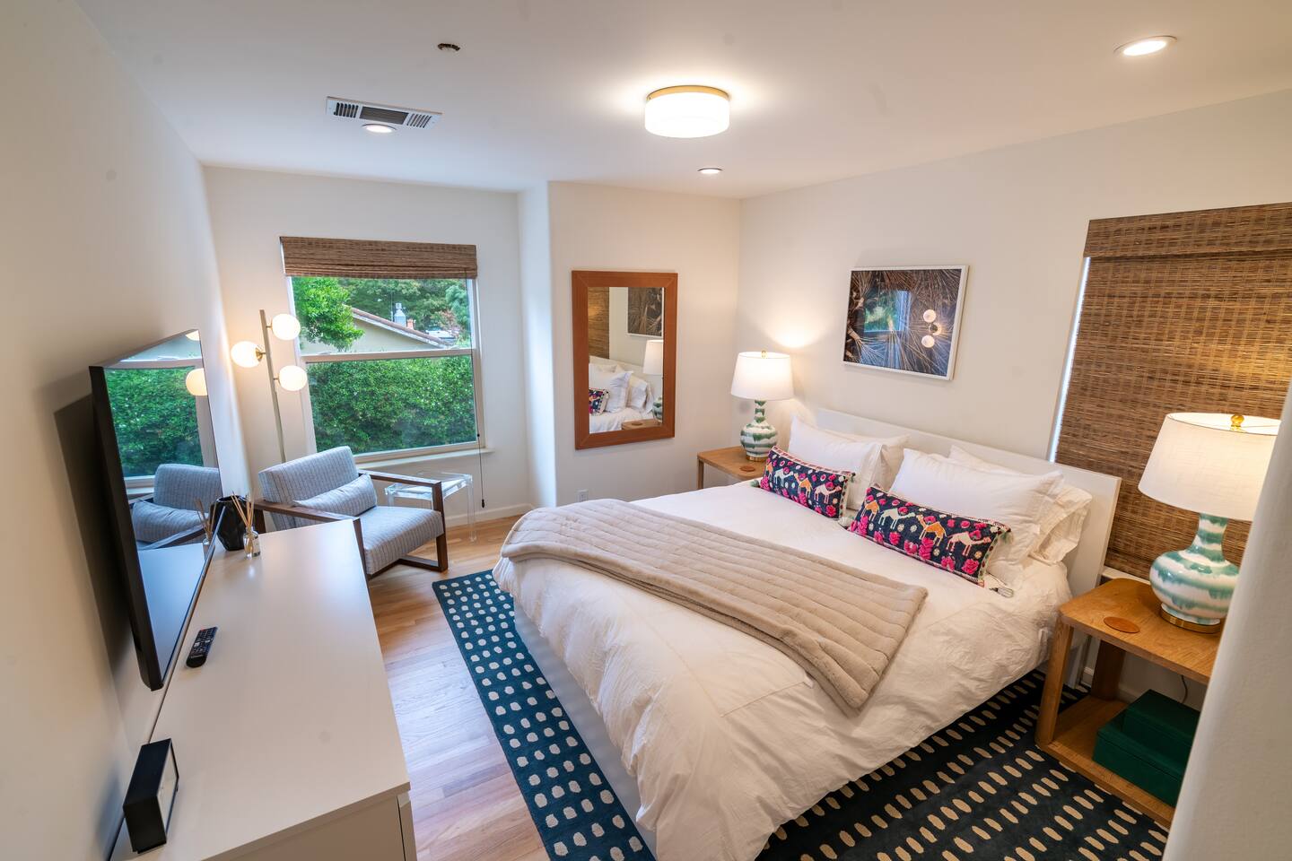 Bedroom 2 with queen bed and smart TV