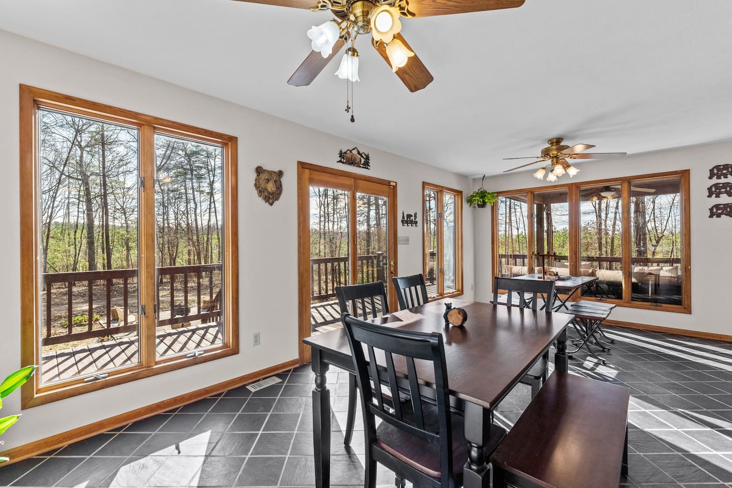 Dining Room: Bright space with scenic views, perfect for memorable meals and laughter!