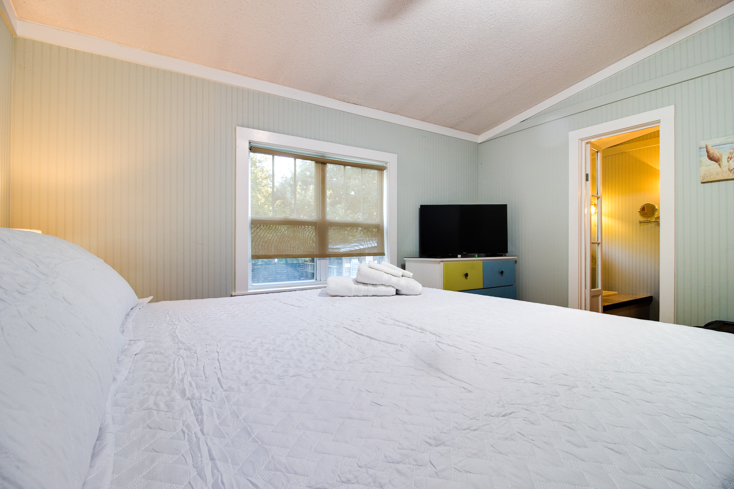 Bedroom 1: Master with Smart TV