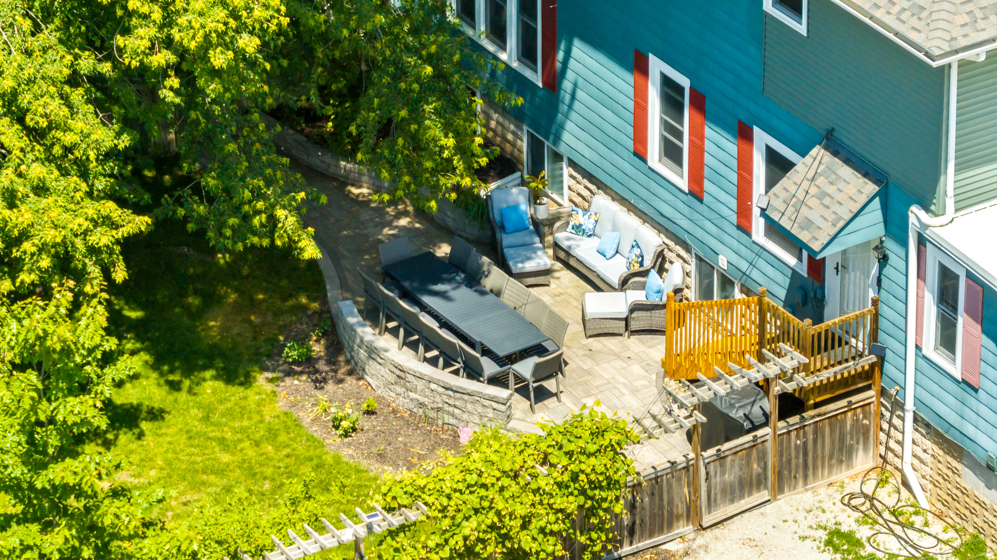 The ultimate backyard hangout. Fire up the grill and gather the whole family together for an open-air dinner under the shade of mature trees.