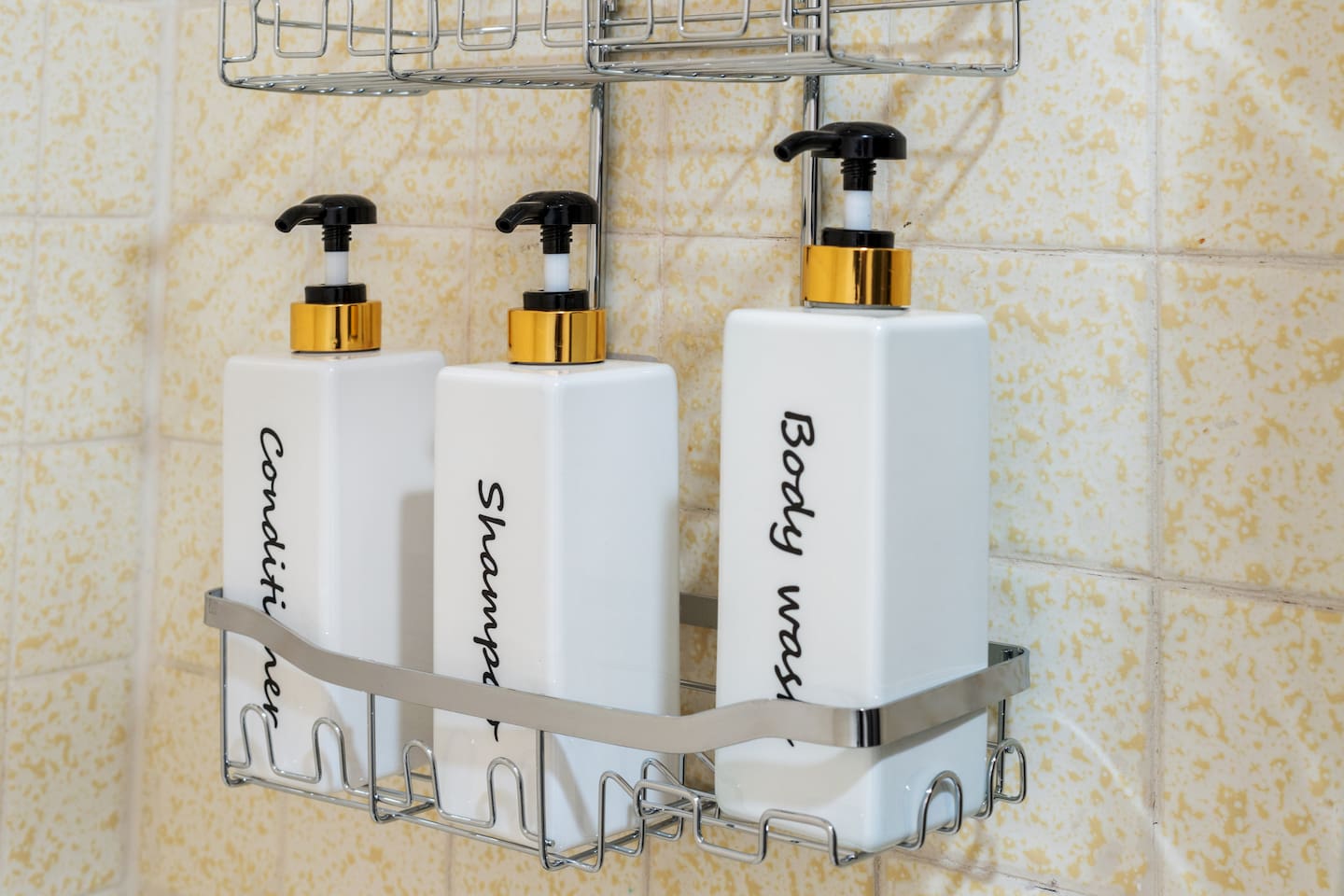 Spa-style shower essentials: enjoy complimentary shampoo, conditioner, and body wash in sleek, refillable dispensers.