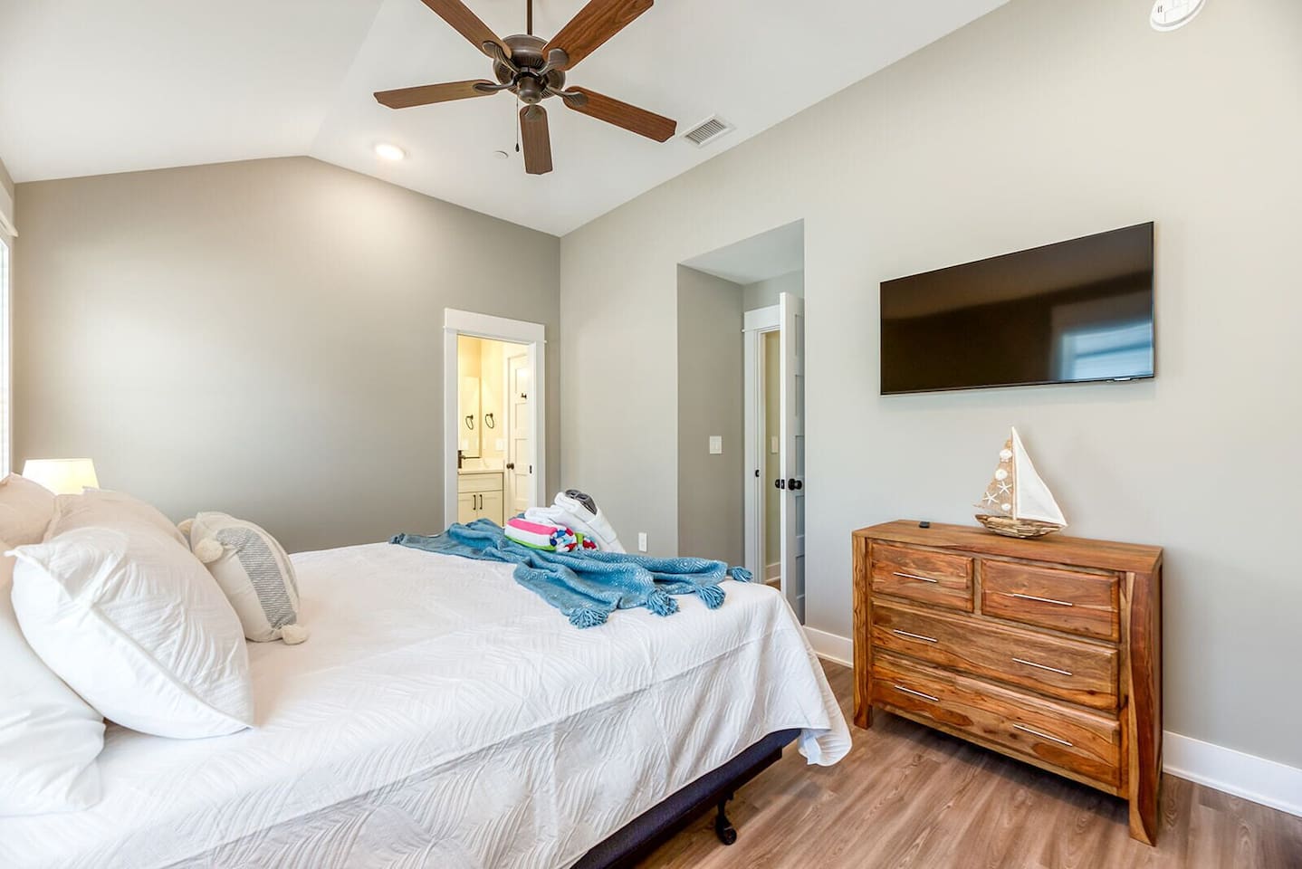 Inviting guest bedroom with a comfortable king-size bed and Smart TV.