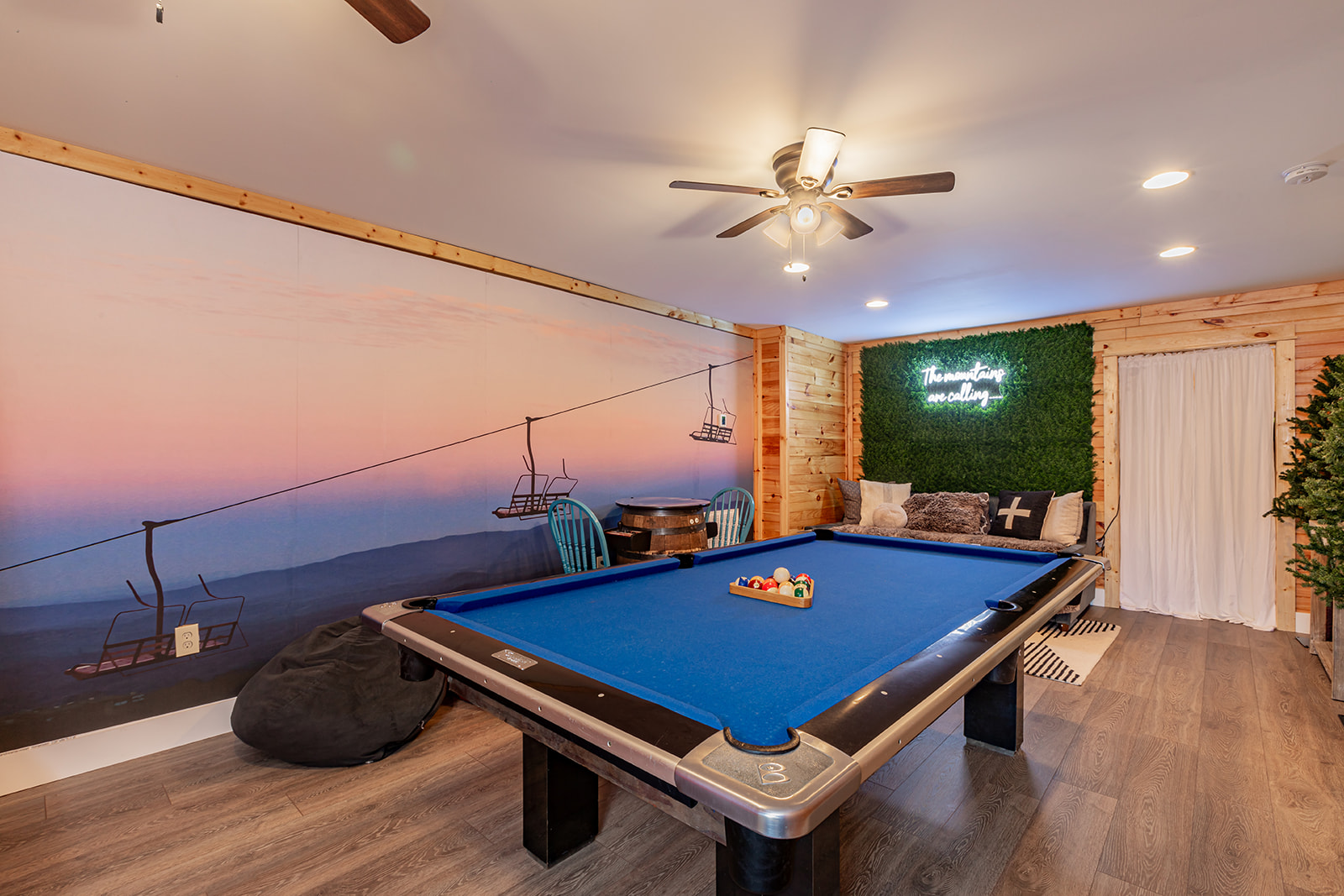 Game room with pool table and daybed