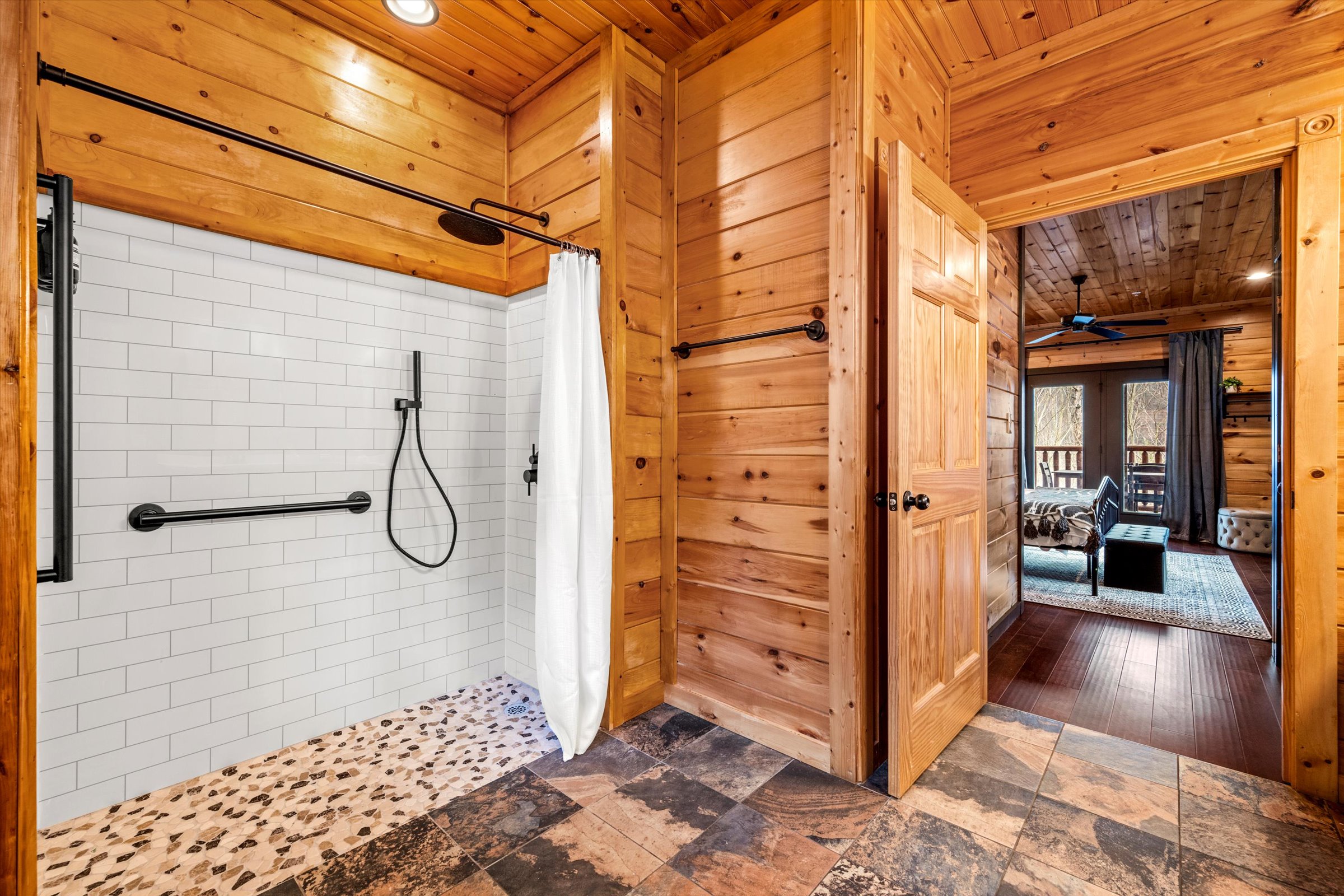 Bedroom 5 has a private bathroom that is also handicap-accessible (has roll in shower with grab bars)