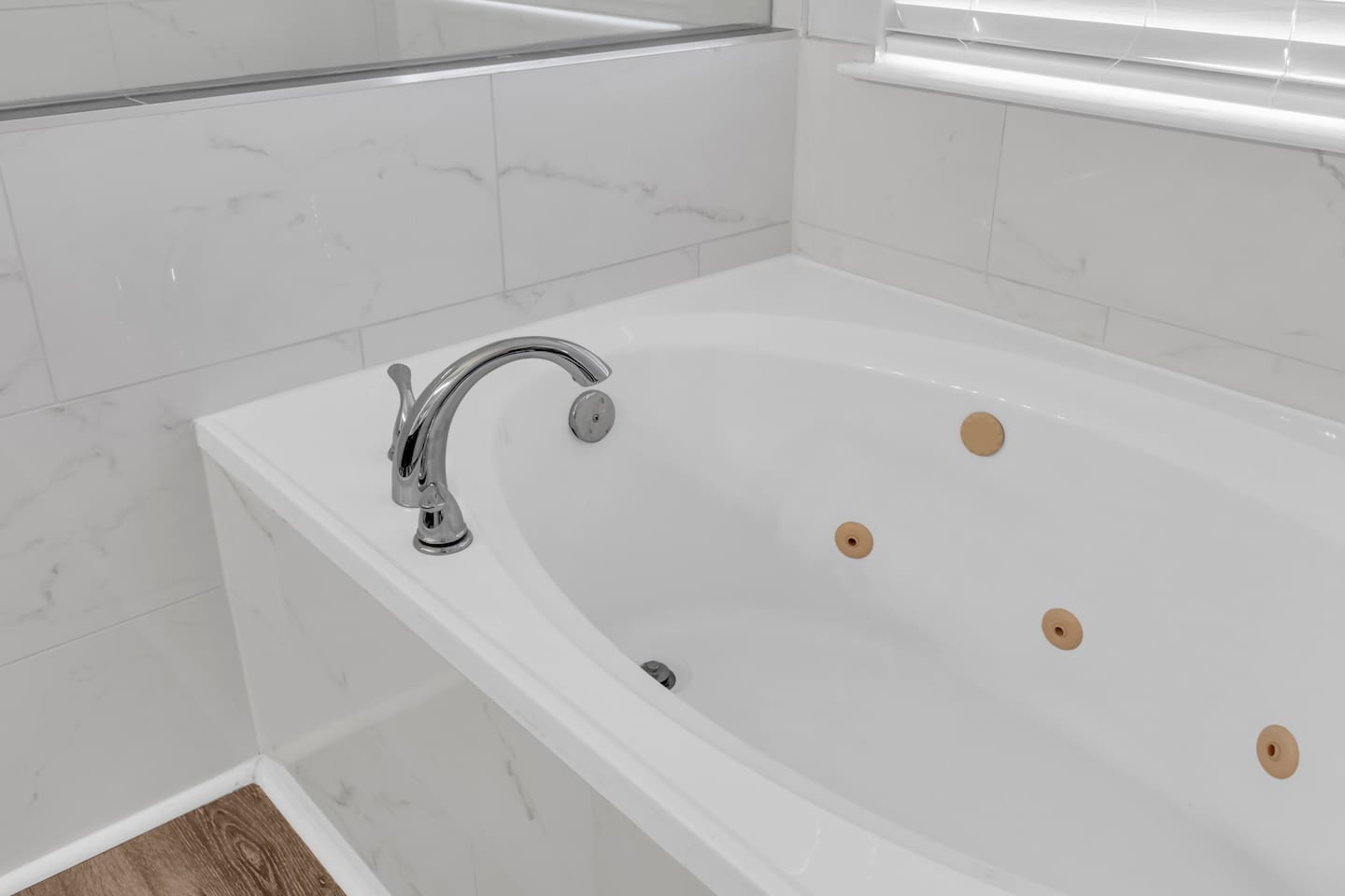 Jacuzzi-style soaking tub designed for relaxation, perfect for unwinding after a full day.
