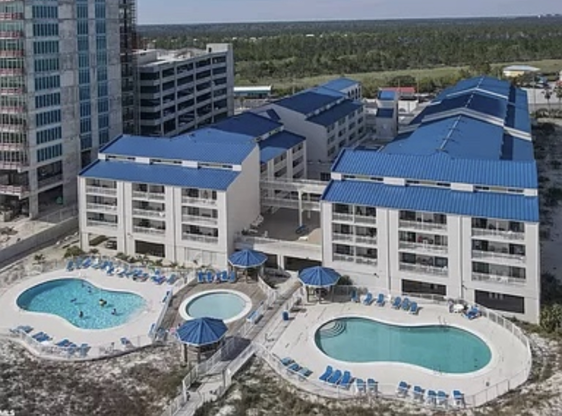 Aerial View of Main Pools and Condominium