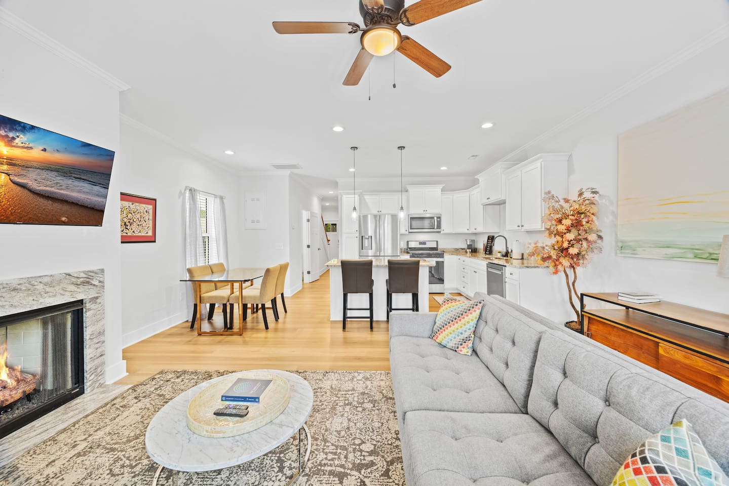 From the fireplace glow to the curated details, every inch of this space says: welcome home.