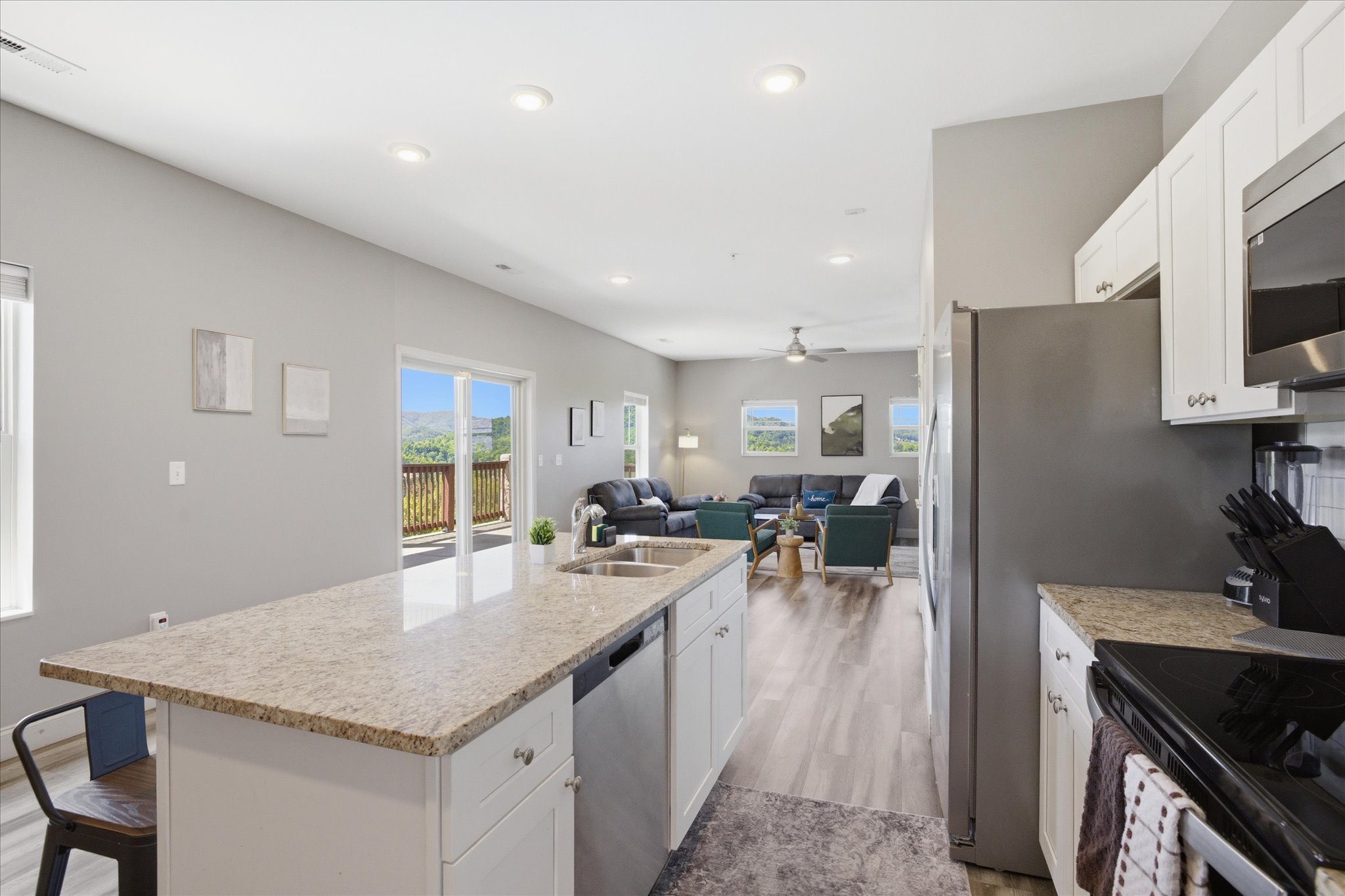 Everything flows here—more counter space, more movement, and a layout that lets people gather without getting in each other’s way. Cooking feels easy, and hanging out just happens.