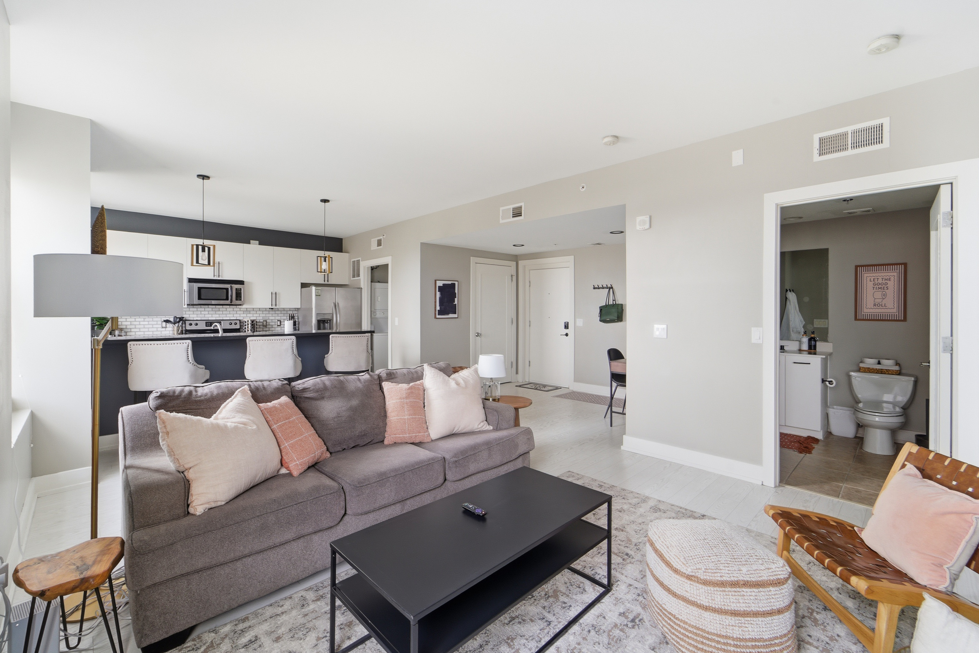 The spacious living room comes equipped with a pullout couch, plush throw pillows and blankets, and fun boardgames for those nights you want to stay in and relax.