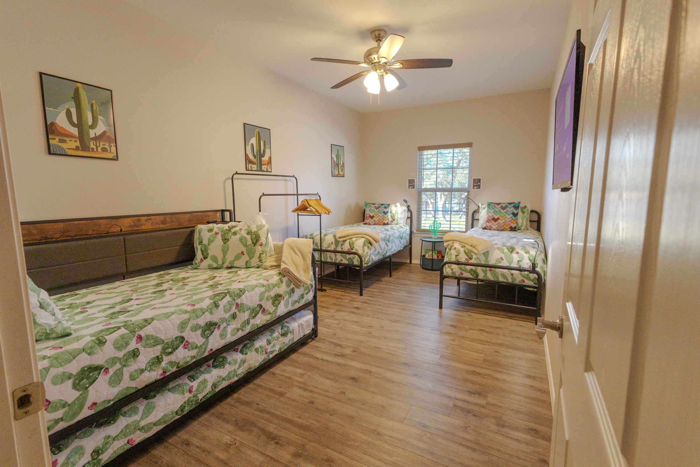 The Cactus Room is a very spacious room if you need the trundle just pull it out, it's always made ready for you 