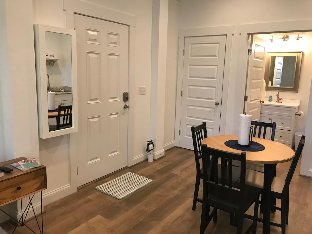Dining area.  P.S. There's an iron and ironing board in the mirror box :)