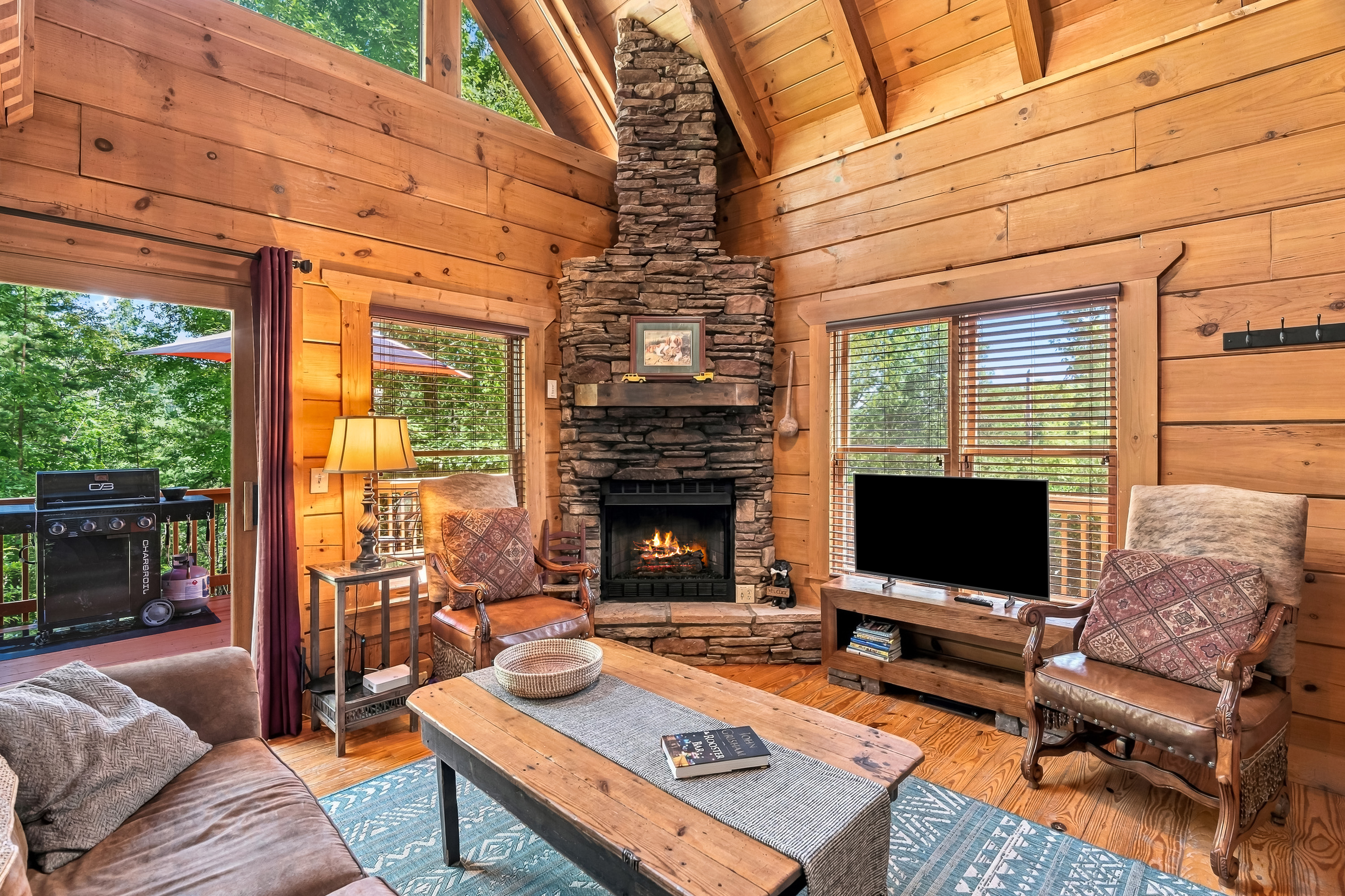 Enjoy the lovely living room with a stone gas fireplace 