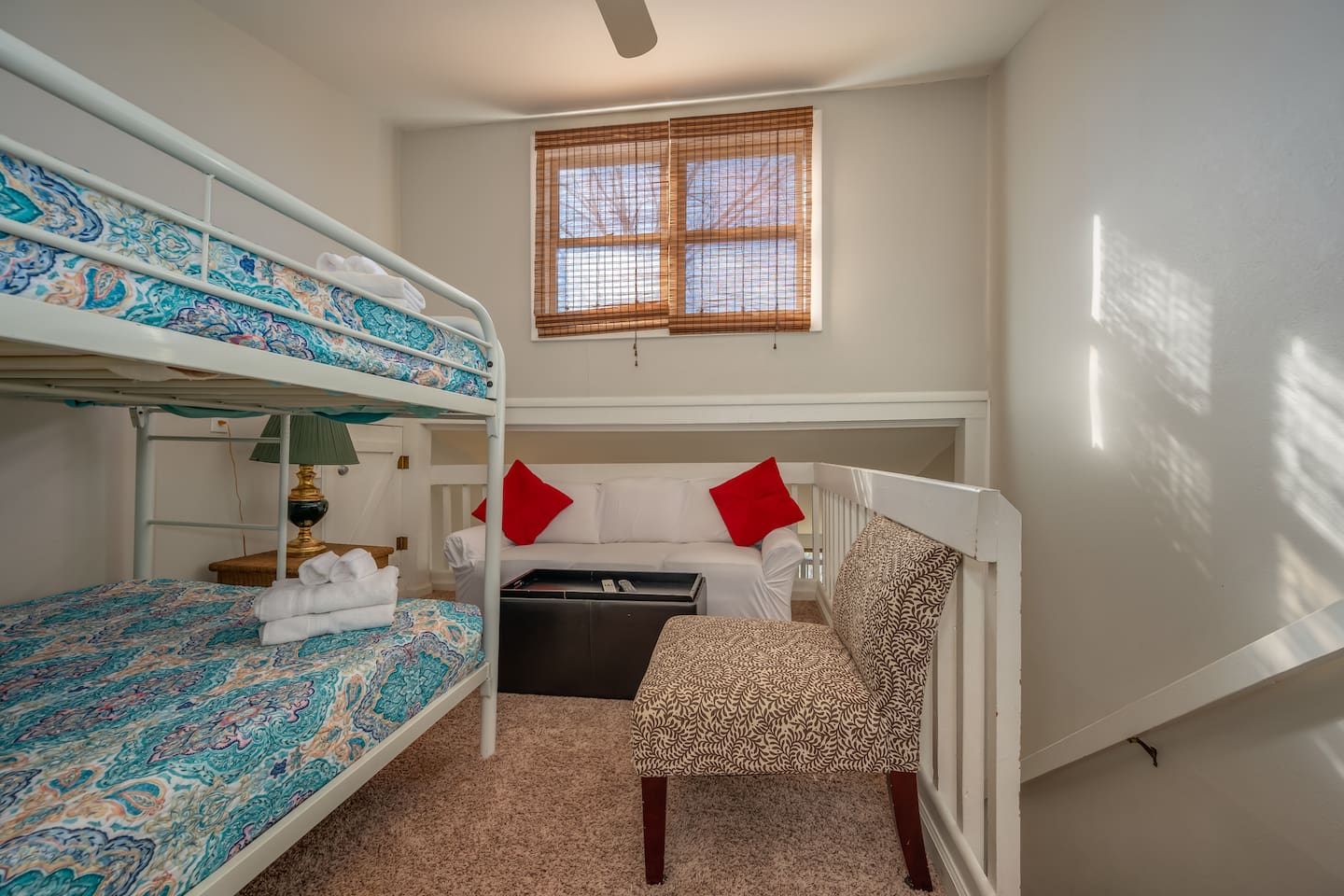 Upstairs loft with full bed bunk and seating