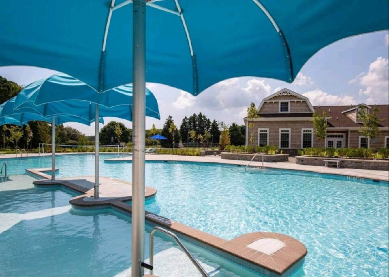 Welcome to our seasonal outdoor pool, available from June to mid-September! Take a dip, soak up the sun on lounge chairs, and enjoy the summertime bliss. It's your go-to spot for relaxation and staying cool during the warmer months